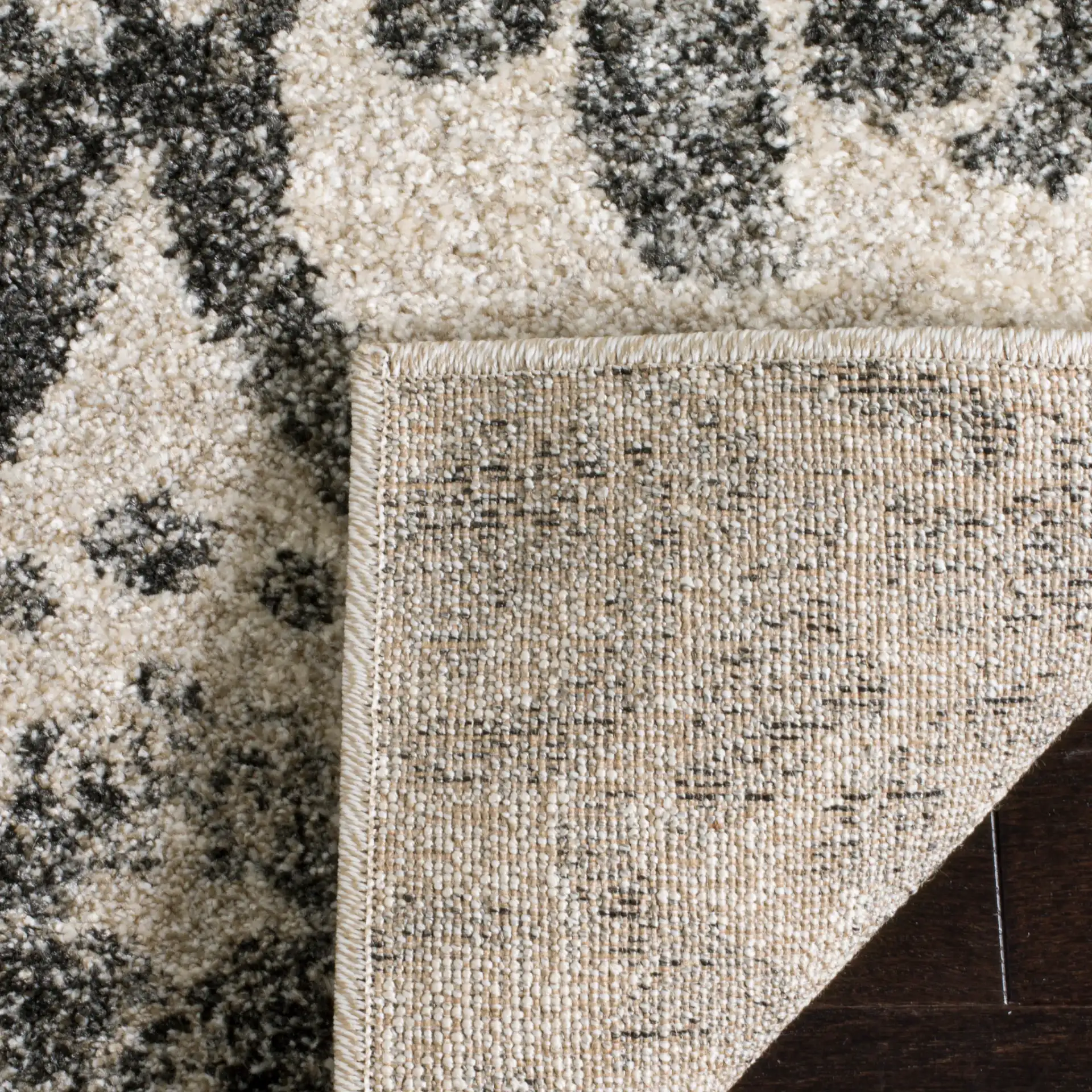 Retro Damask Rug in Cream / Gray in a styled room