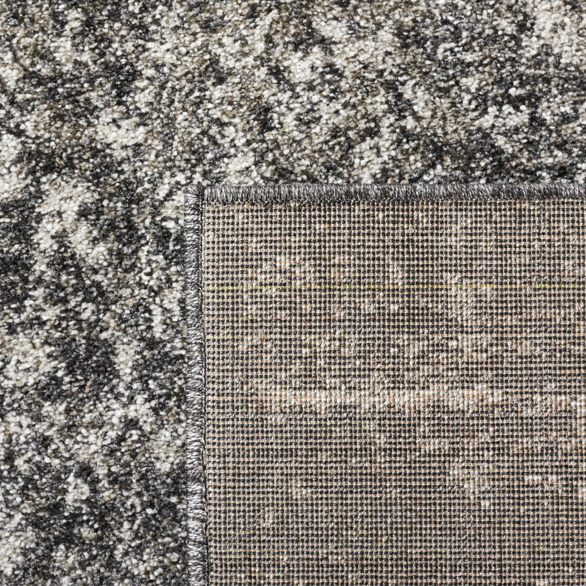 Retro Modern Ombre Rug in Black / Light Gray in a styled room