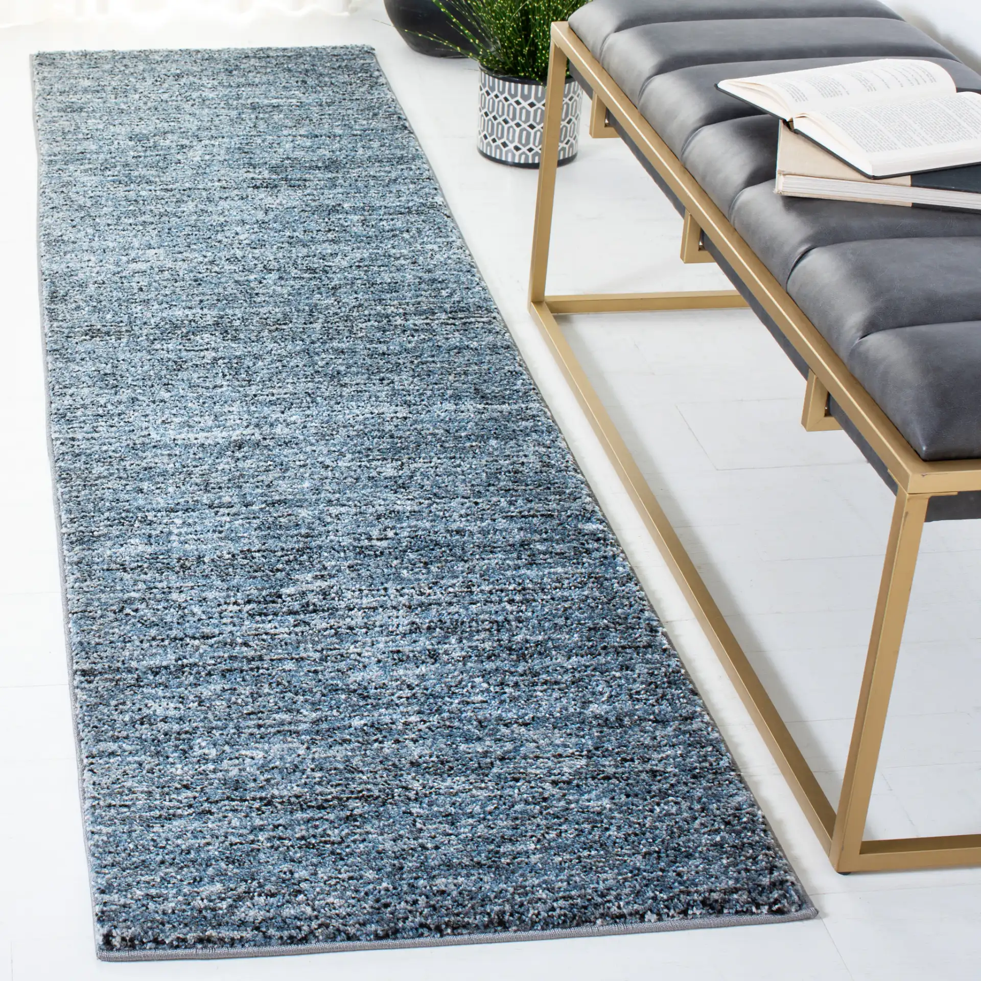 Retro Striated Solid Rug in Gray / Blue in a styled room