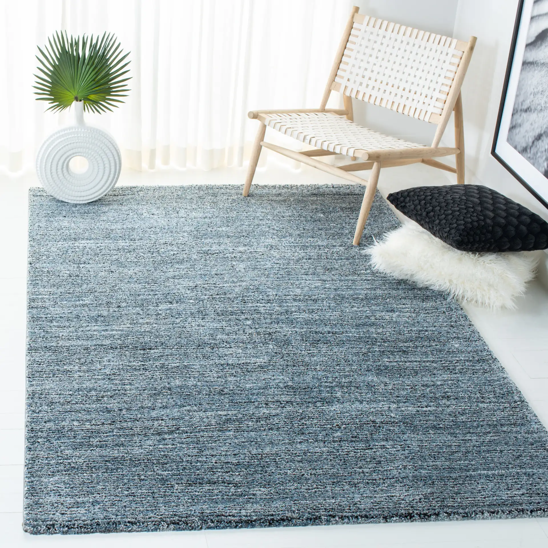 Retro Striated Solid Rug in Gray / Blue in a styled room