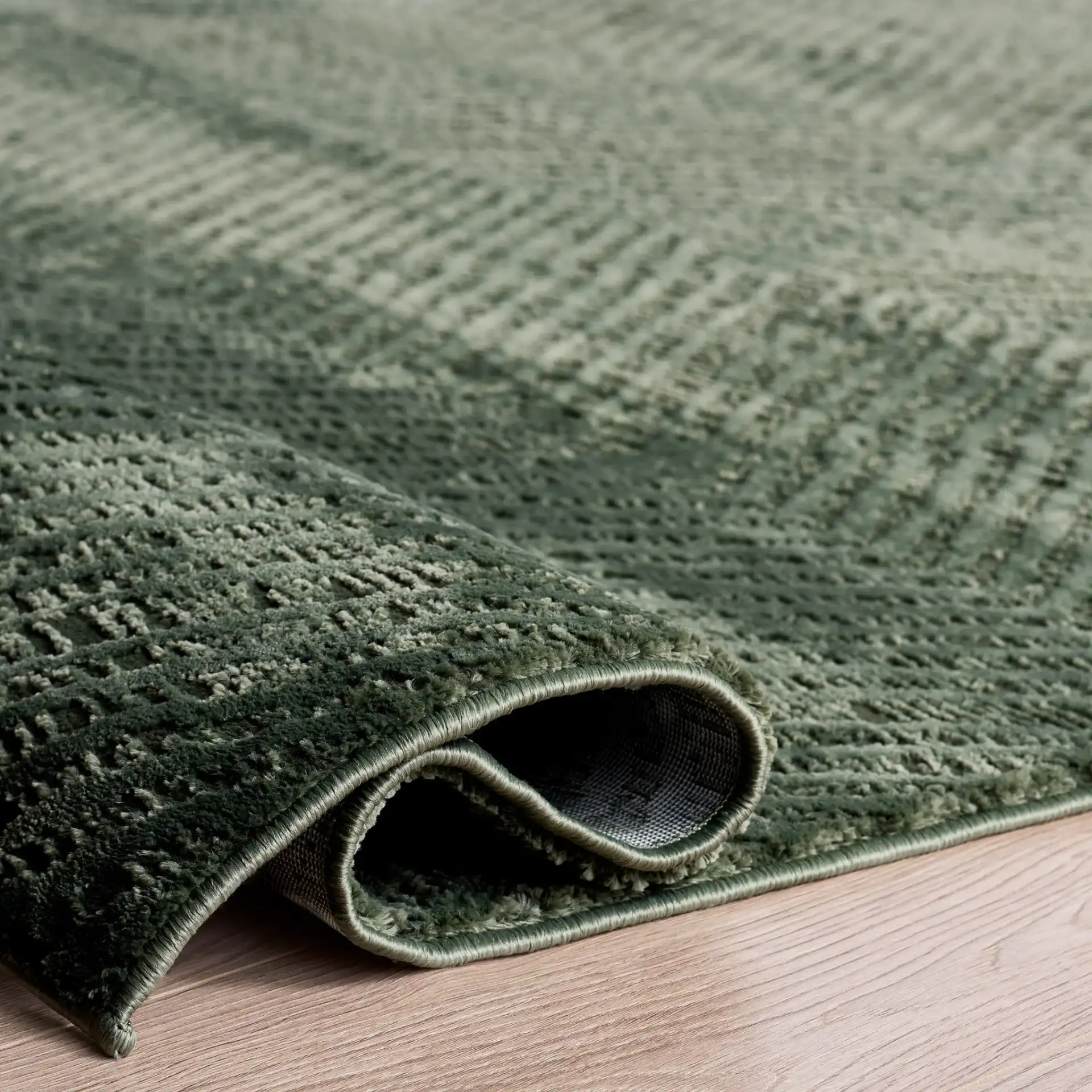 Revive Chevron Rug in Green in a styled room