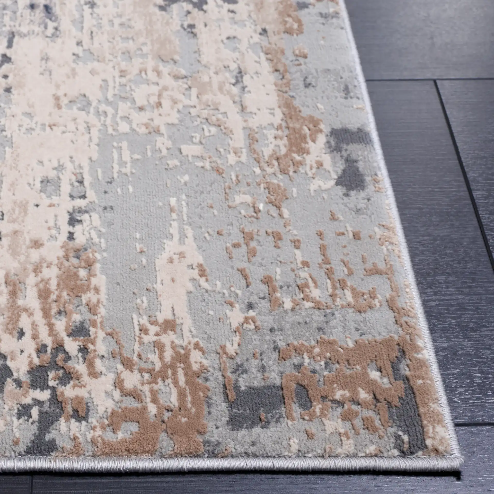 Reflection Distressed Abstract Rug in Cream / Gray in a styled room