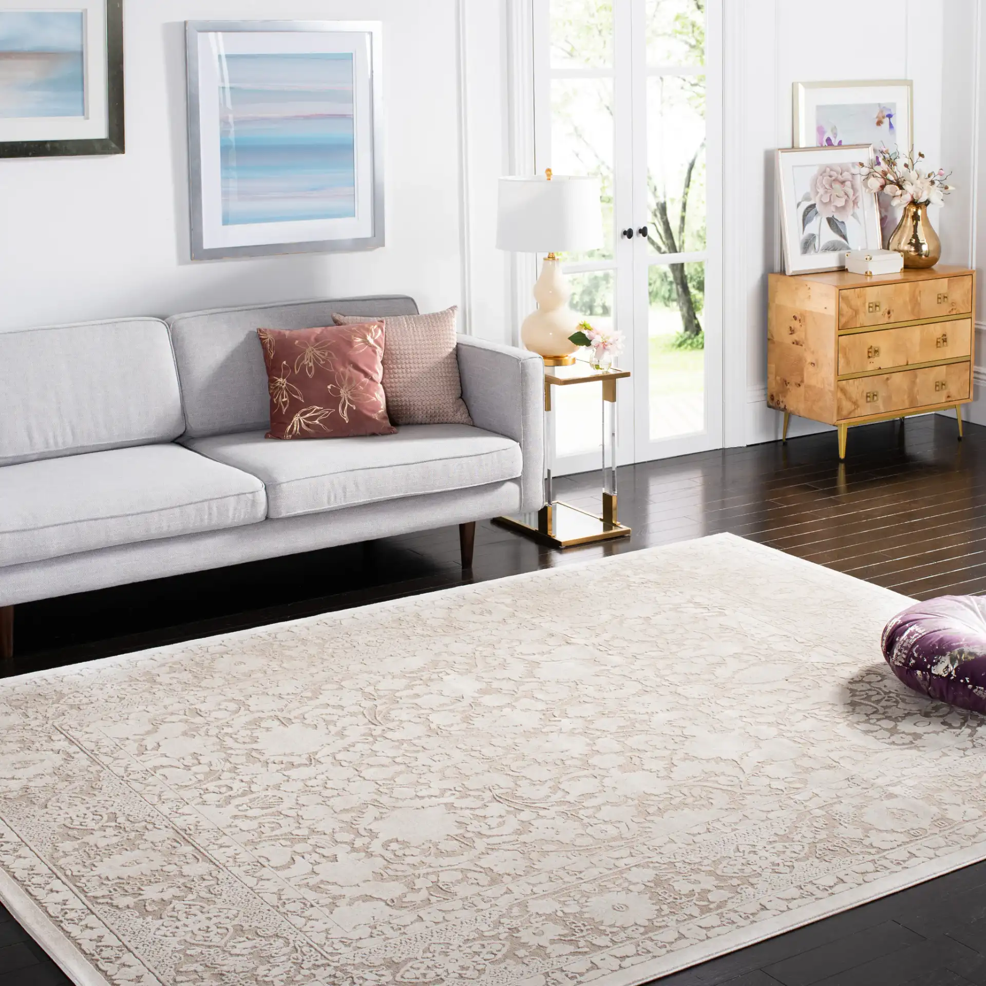 Reflection Bordered Floral Rug in Beige / Cream in a styled room