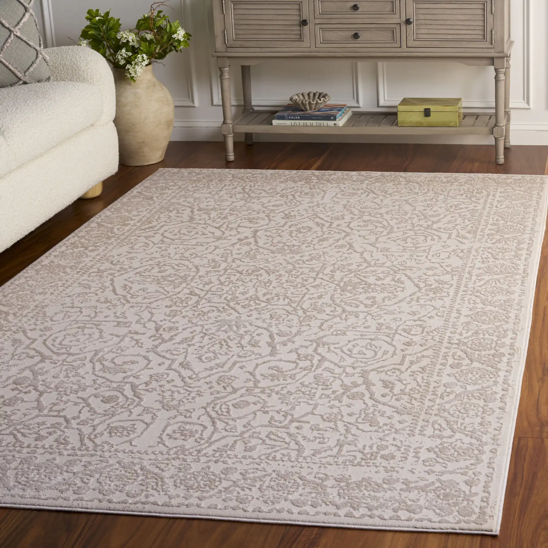 Reflection Elegance Medallion Border Rug in Ivory / White in a styled room