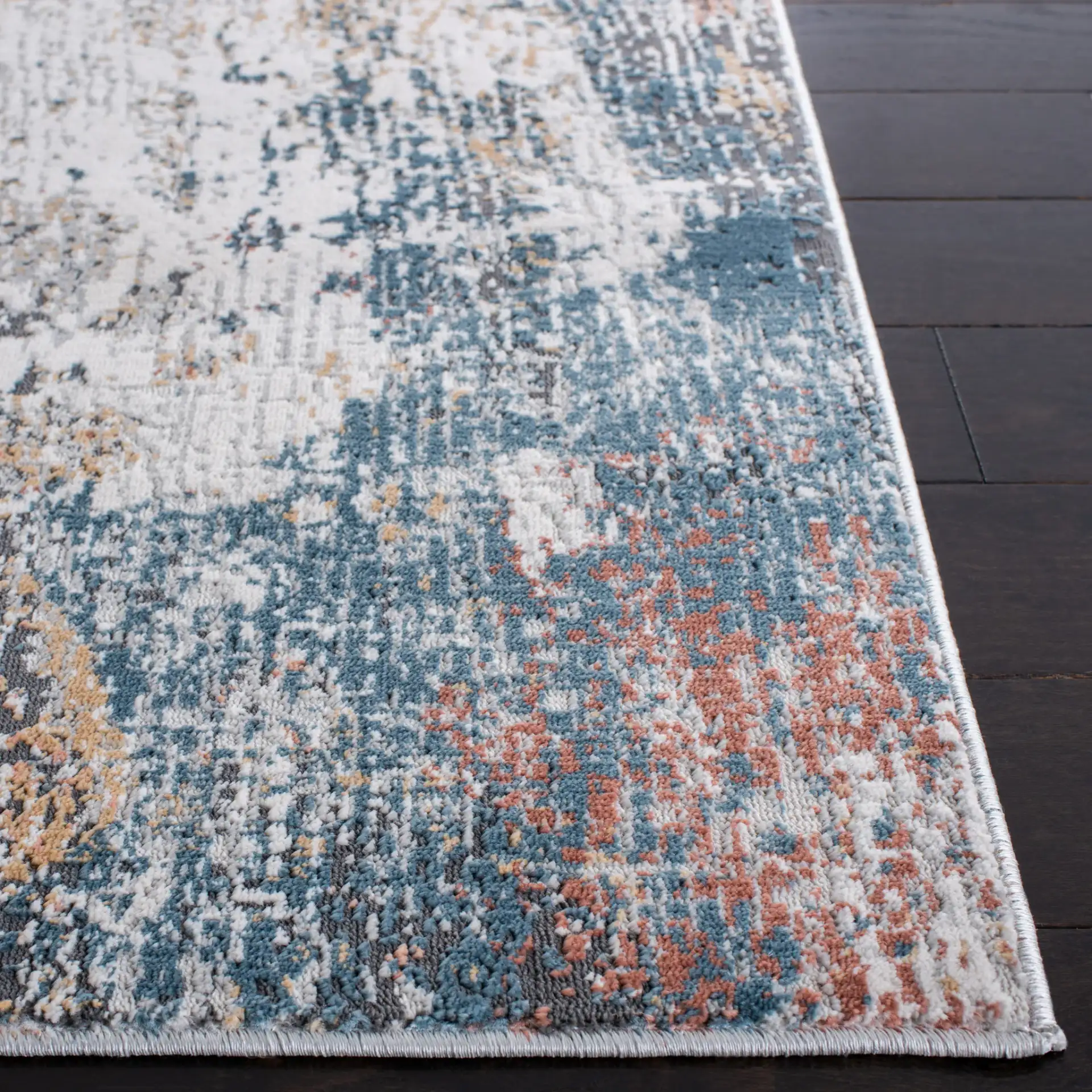 Reflection Modern Abstract Rug in Gray / Blue in a styled room