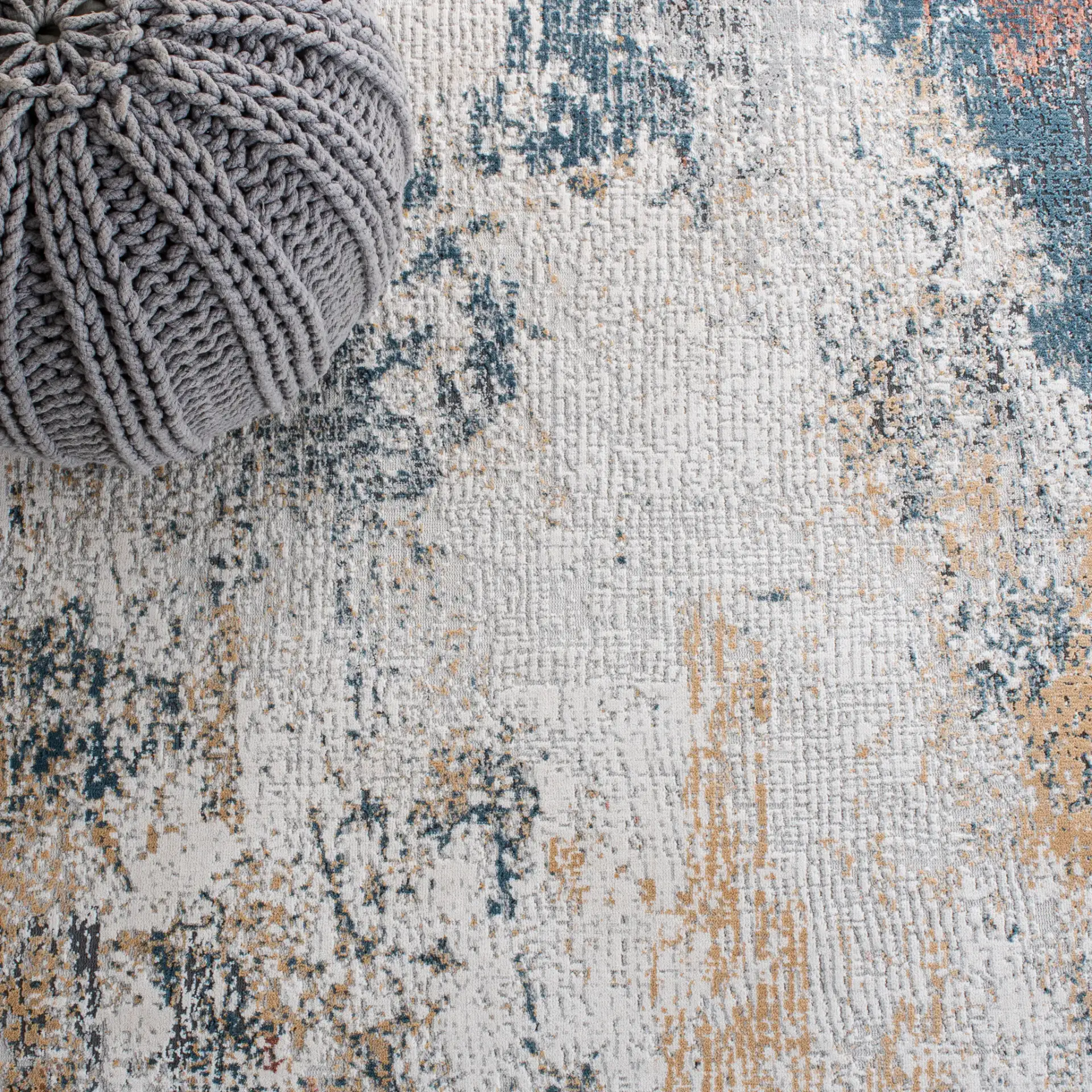 Reflection Modern Abstract Rug in Gray / Blue in a styled room