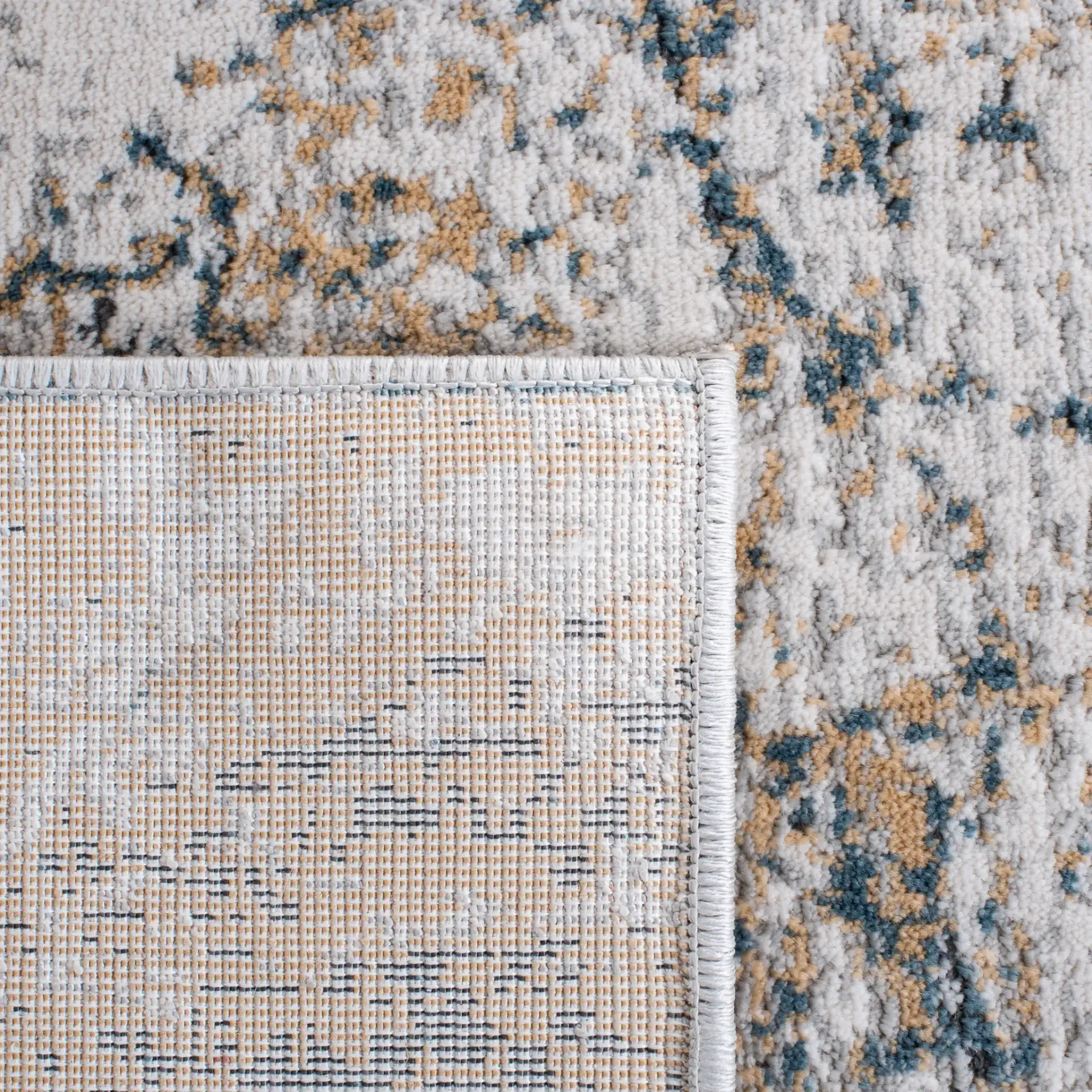 Reflection Modern Abstract Rug in Gray / Blue in a styled room