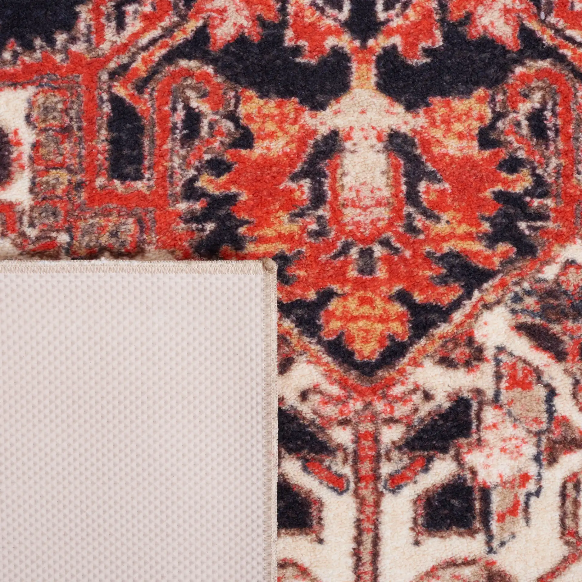 Riviera Medallion Bordered Washable Rug in Ivory / Blue in a styled room