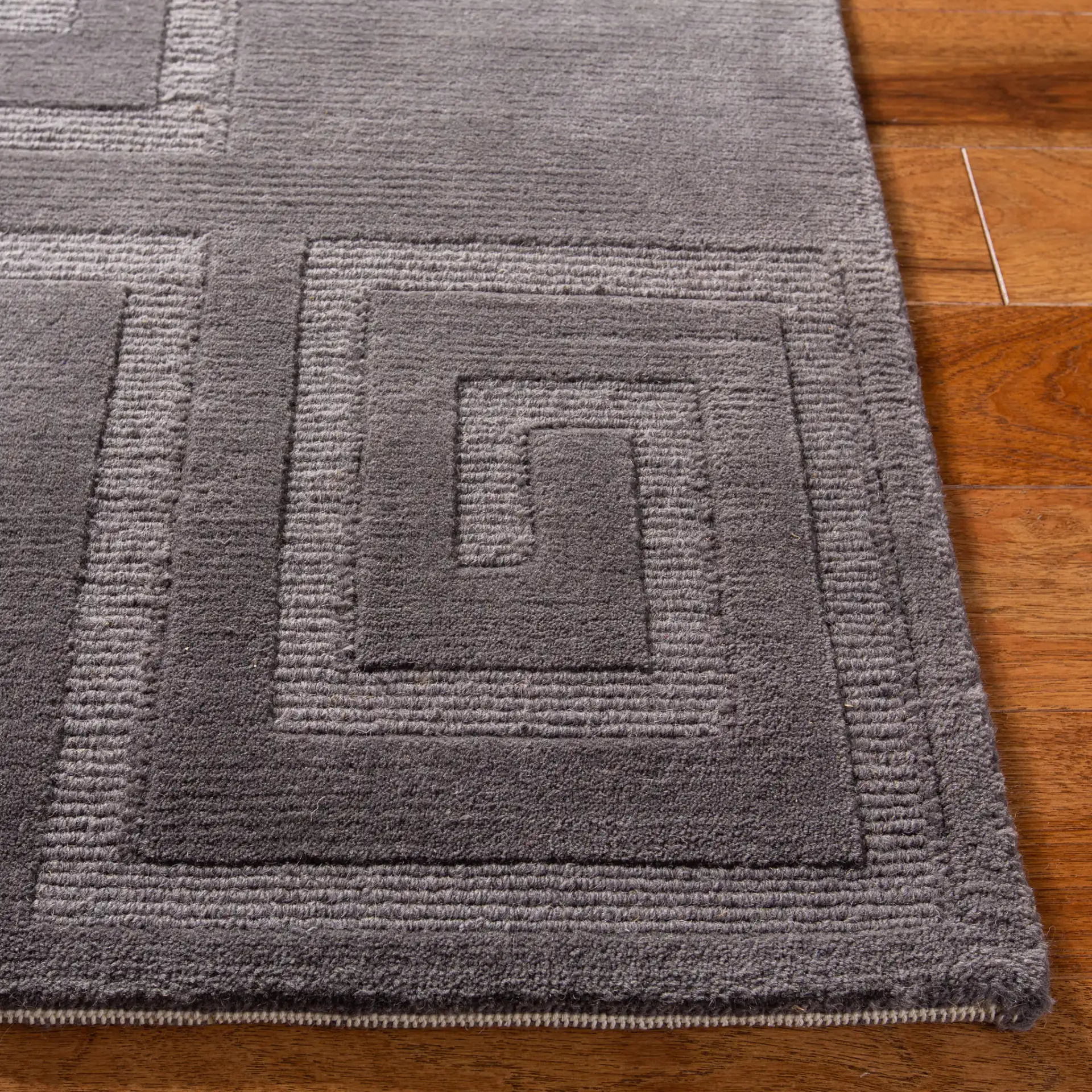 Ralph Lauren Roxy Hand-Knotted Wool Rug in Slate / Tonal in a styled room