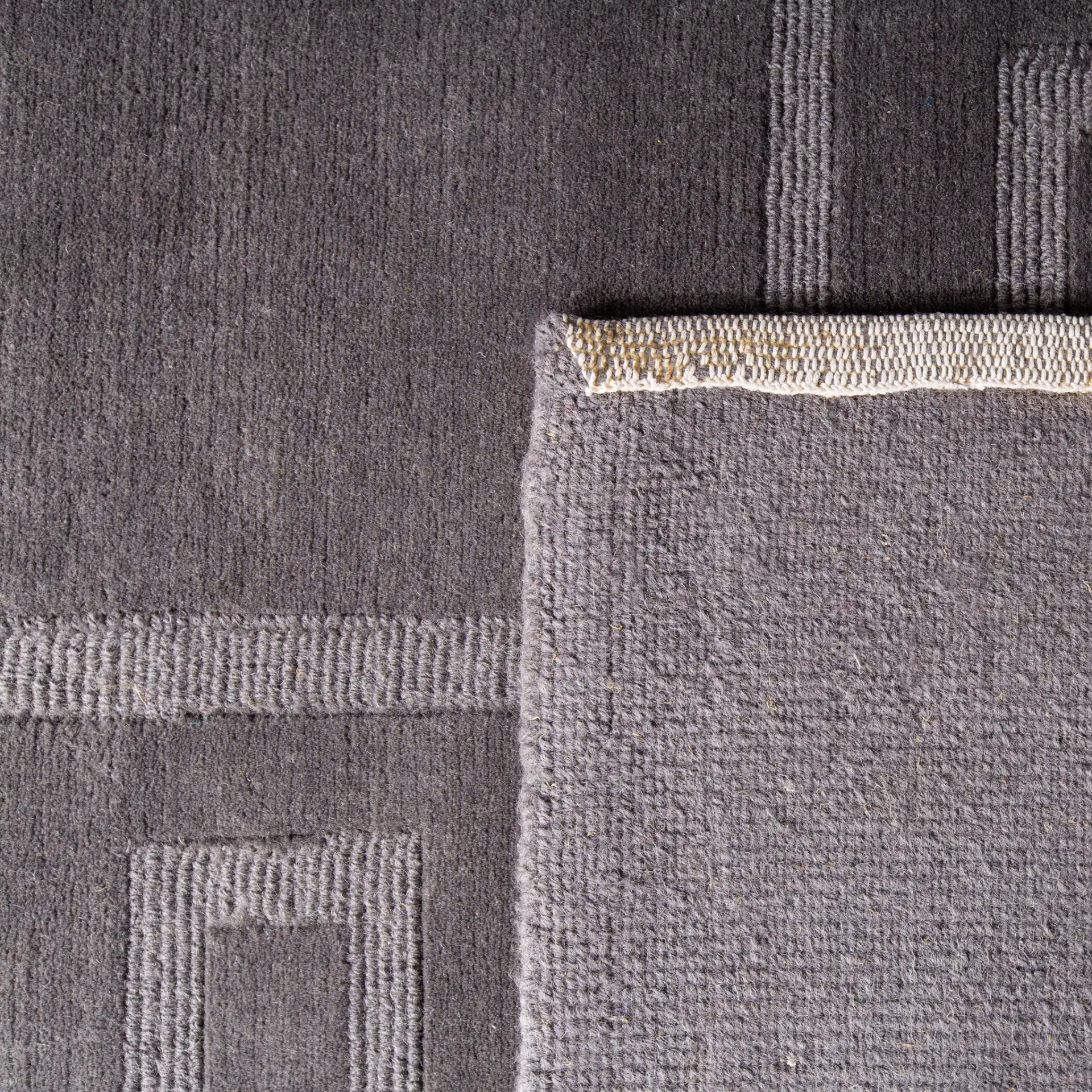 Ralph Lauren Roxy Hand-Knotted Wool Rug in Slate / Tonal in a styled room