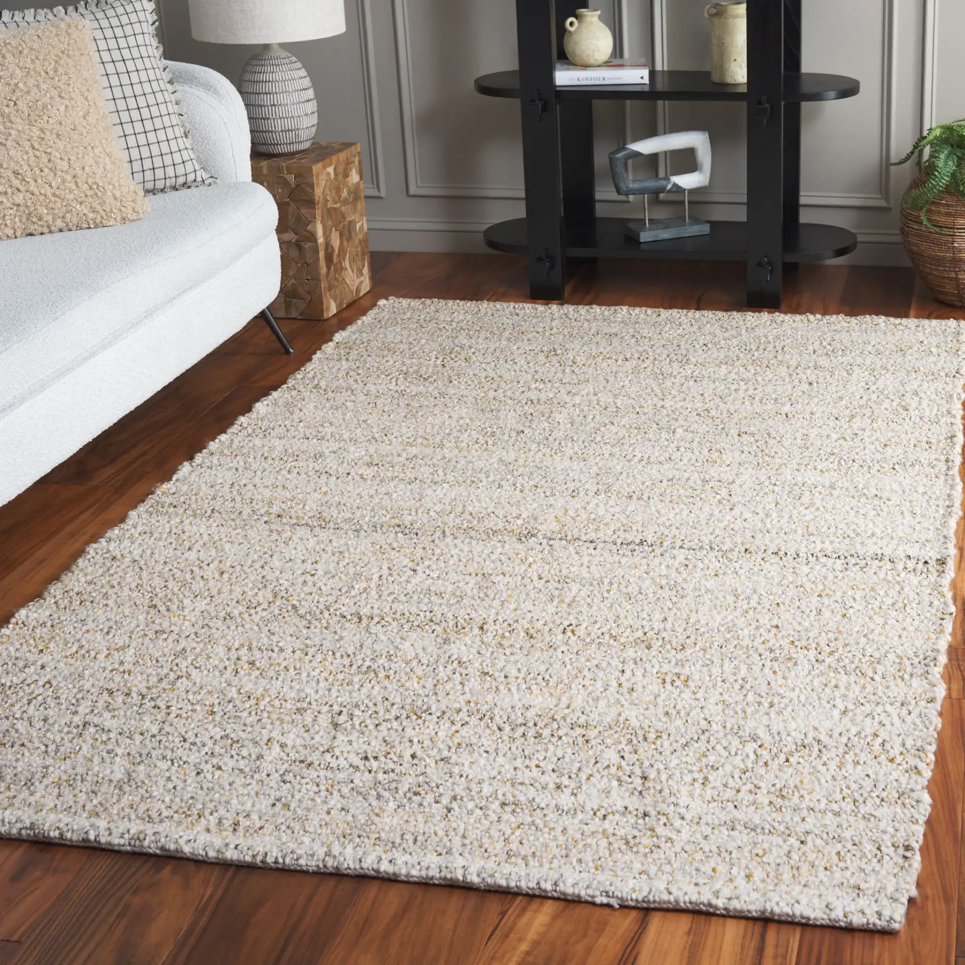 Renewal Solid Ribbed Rug in Beige / Gold in a styled room
