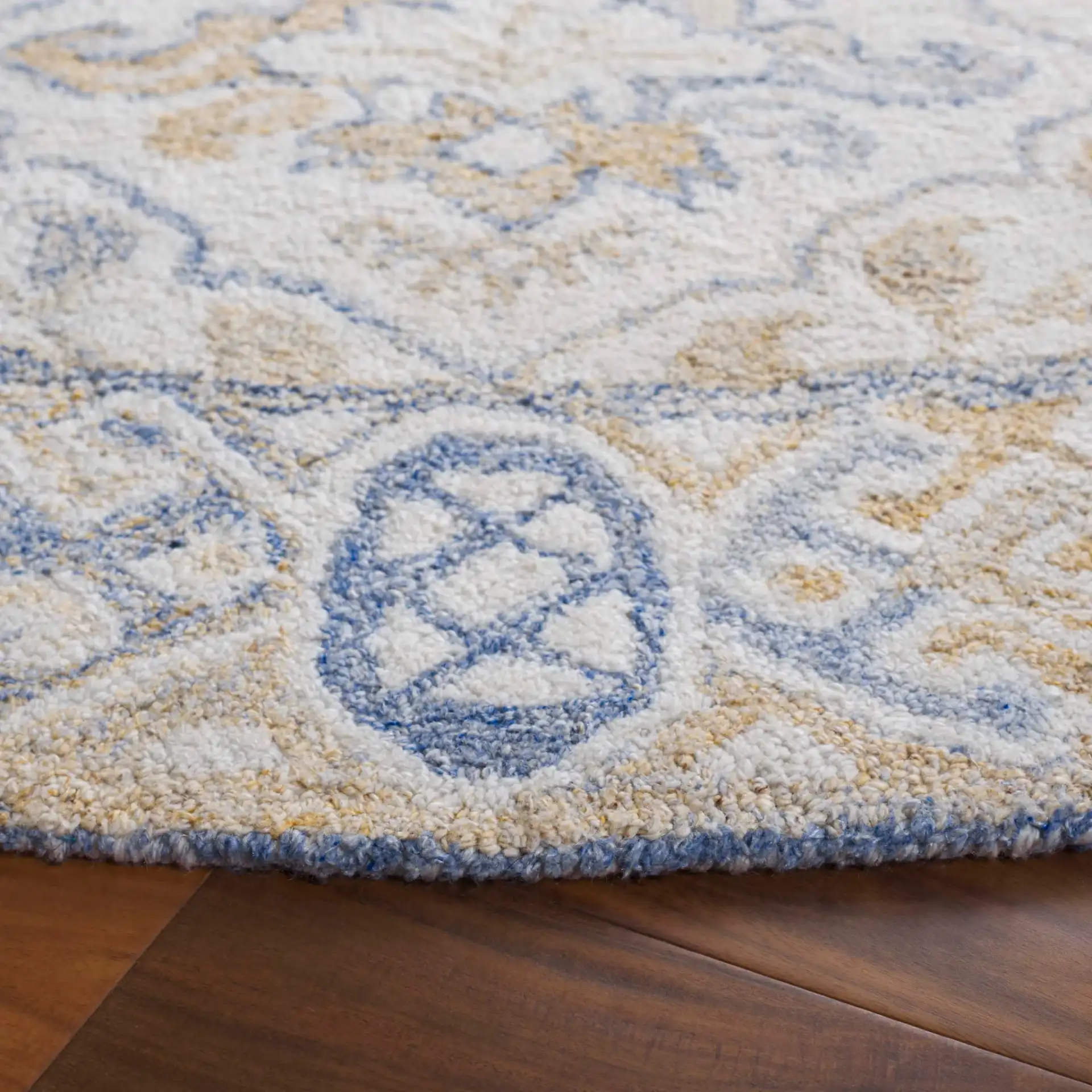 Renewal Floral Lattice Hand-Tufted Rug in Beige / Gray in a styled room