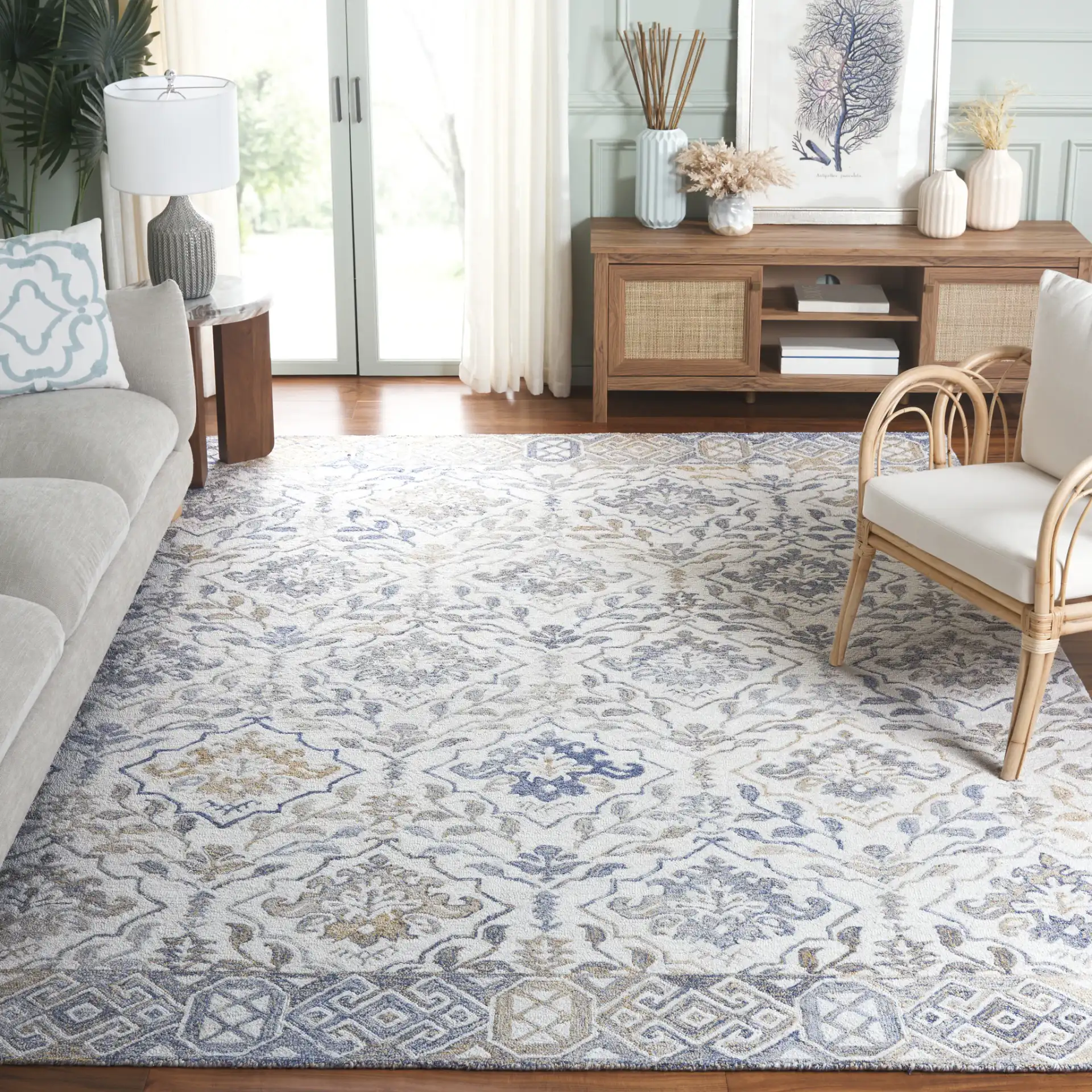 Renewal Floral Lattice Hand-Tufted Rug in Beige / Gray in a styled room