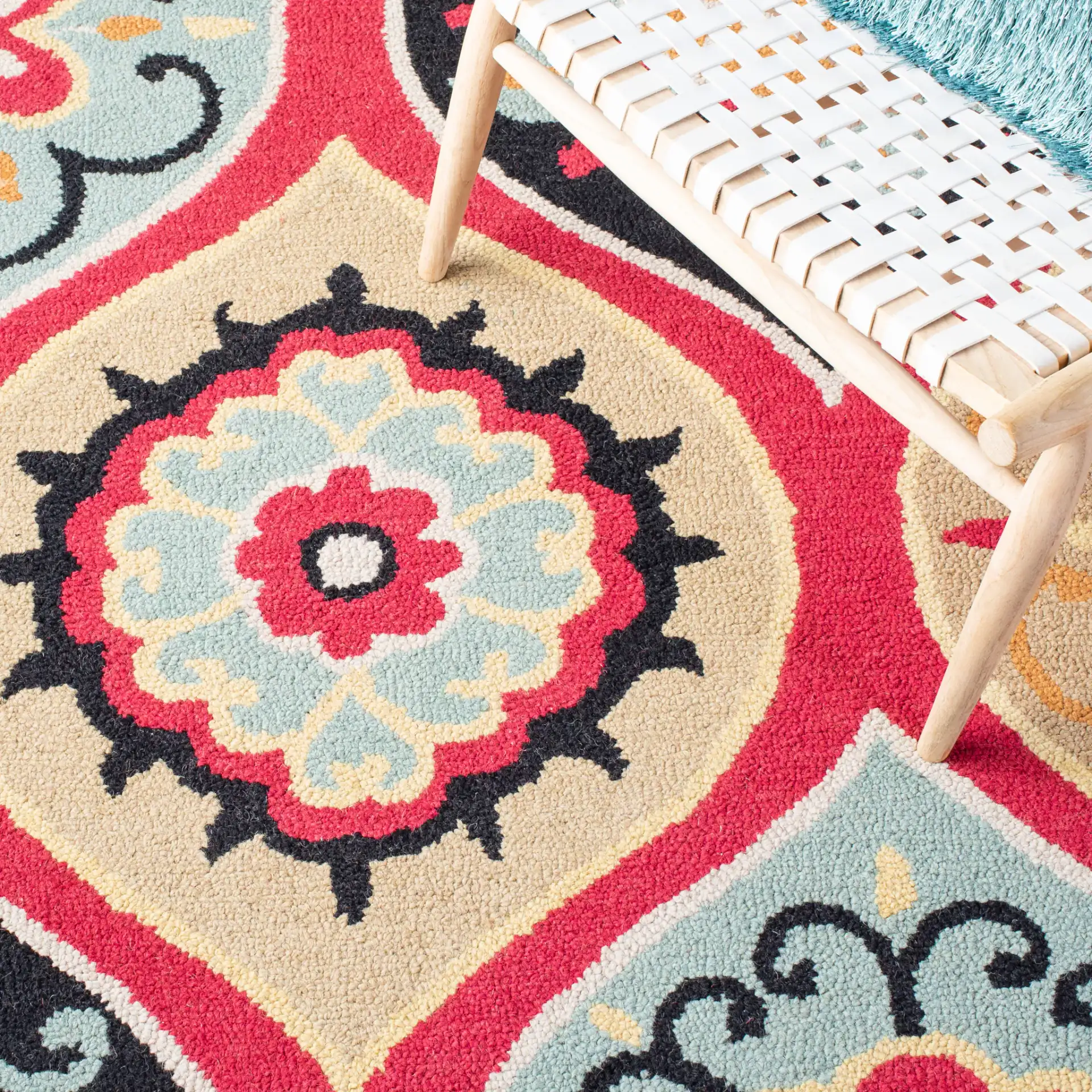 Roslyn Floral Medallion Hand-Tufted Wool Rug in Blue / Multicolor in a styled room