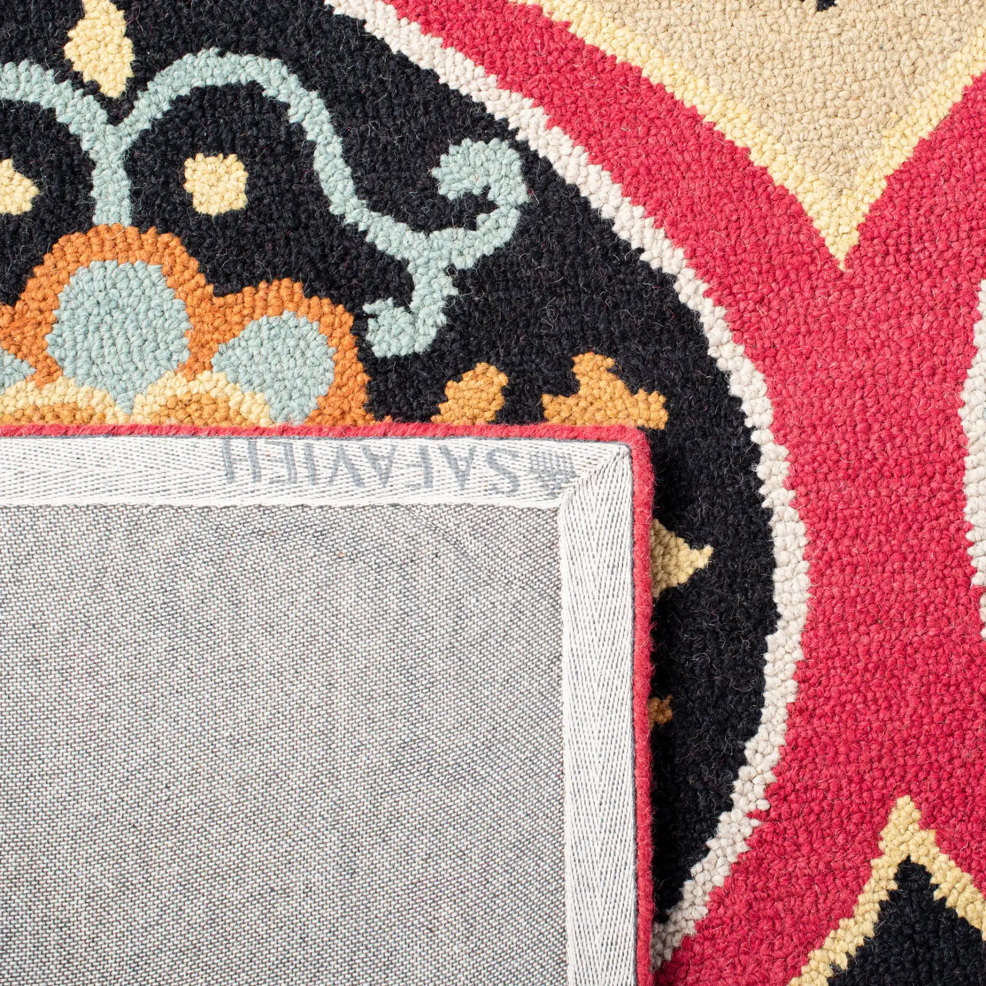 Roslyn Floral Medallion Hand-Tufted Wool Rug in Blue / Multicolor in a styled room