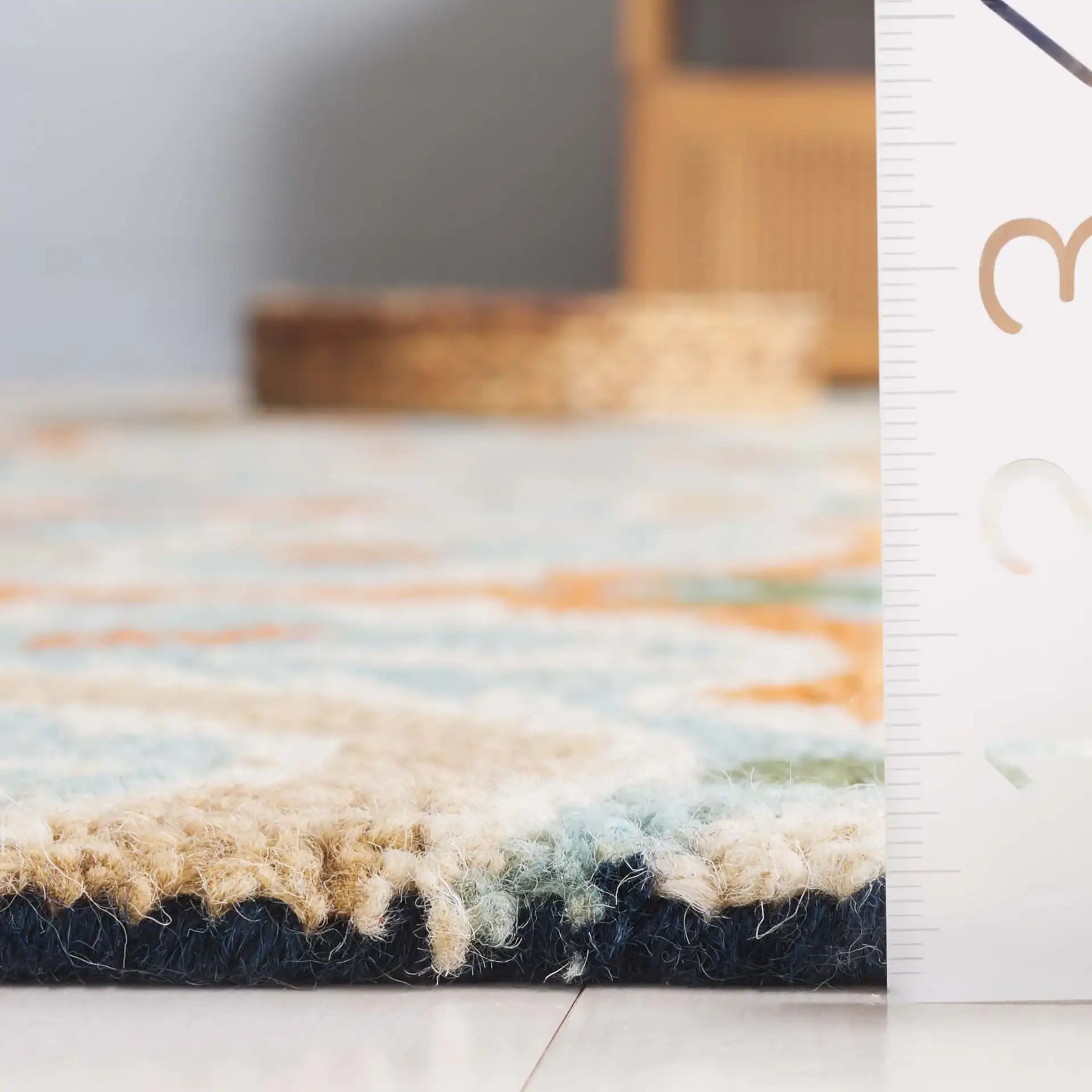 Roslyn Ogee Hand-Tufted Wool Rug in Blue / Beige in a styled room