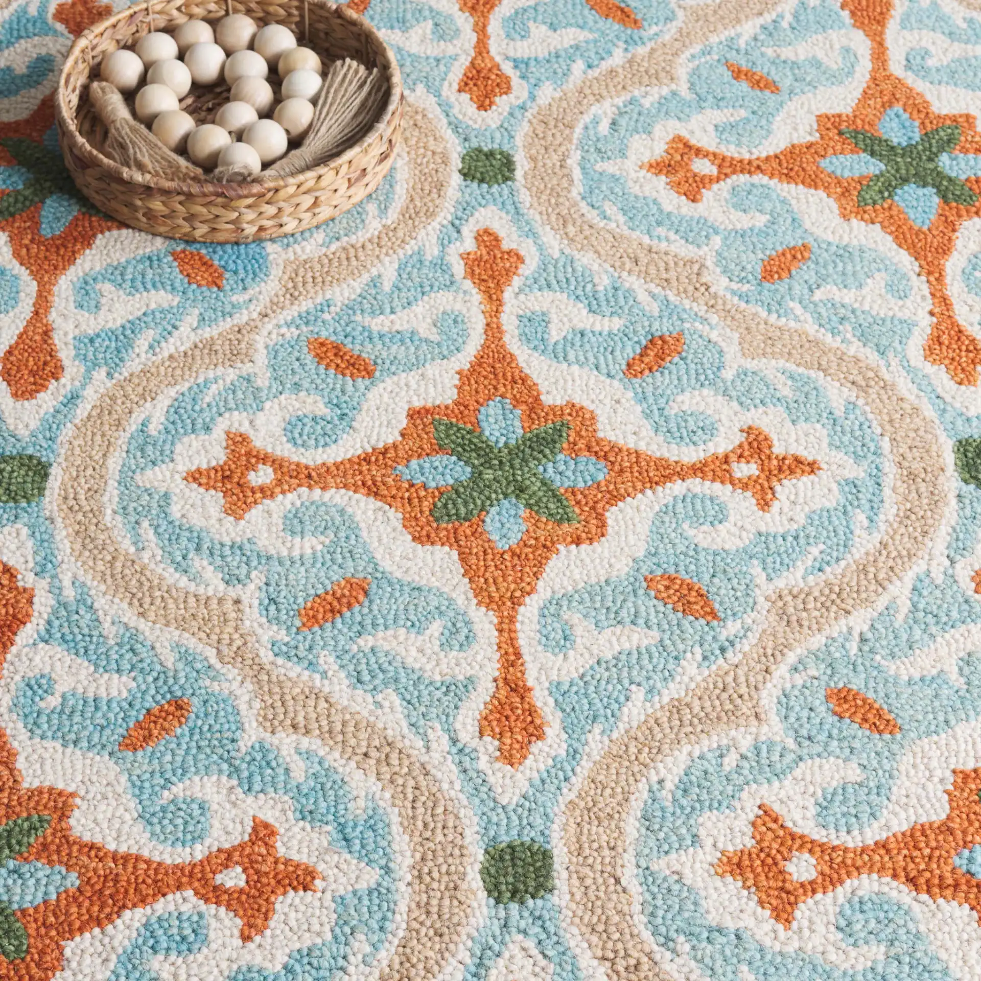 Roslyn Ogee Hand-Tufted Wool Rug in Blue / Beige in a styled room