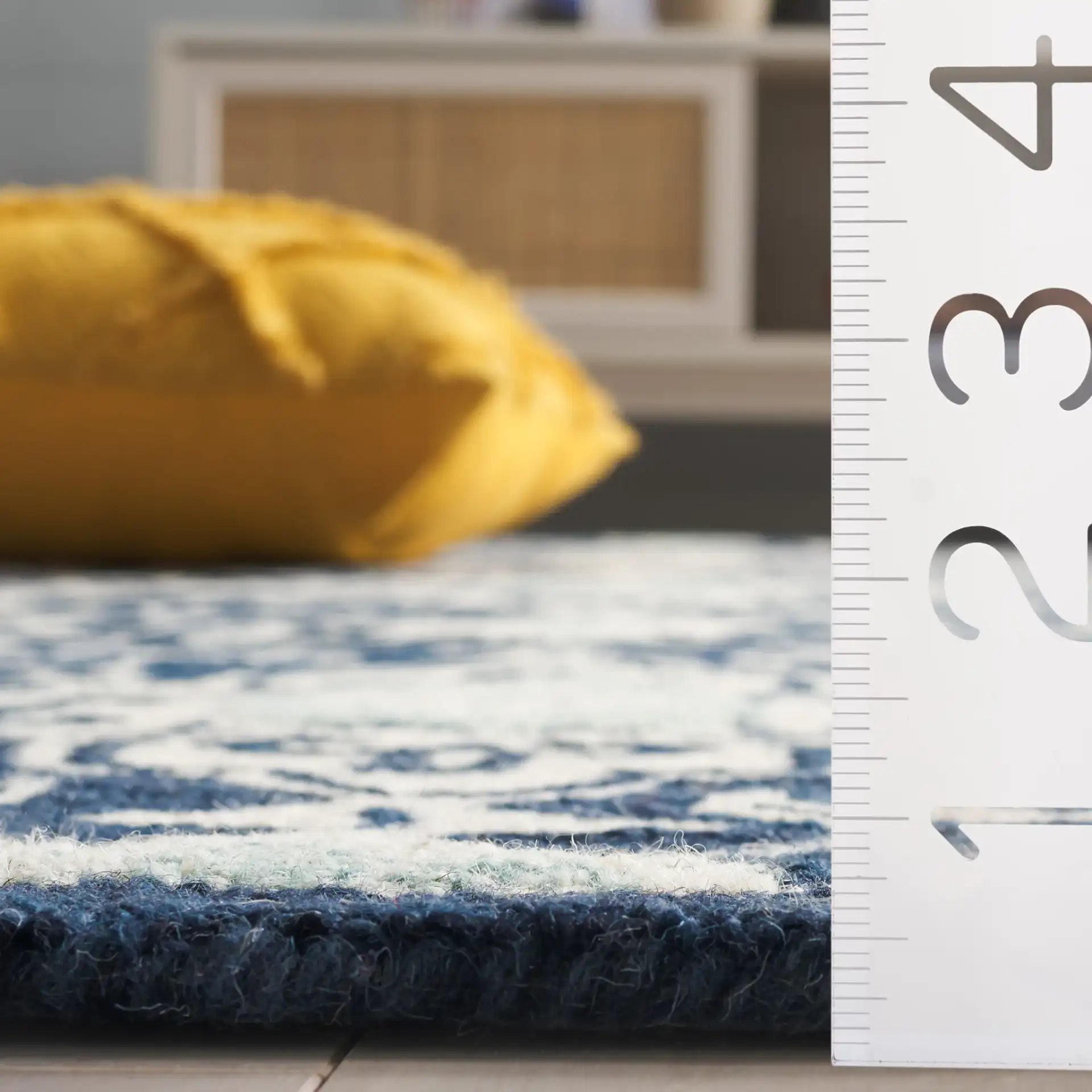 Roslyn Interlocking Tile Hand-Tufted Wool Rug in Navy / Light Blue in a styled room