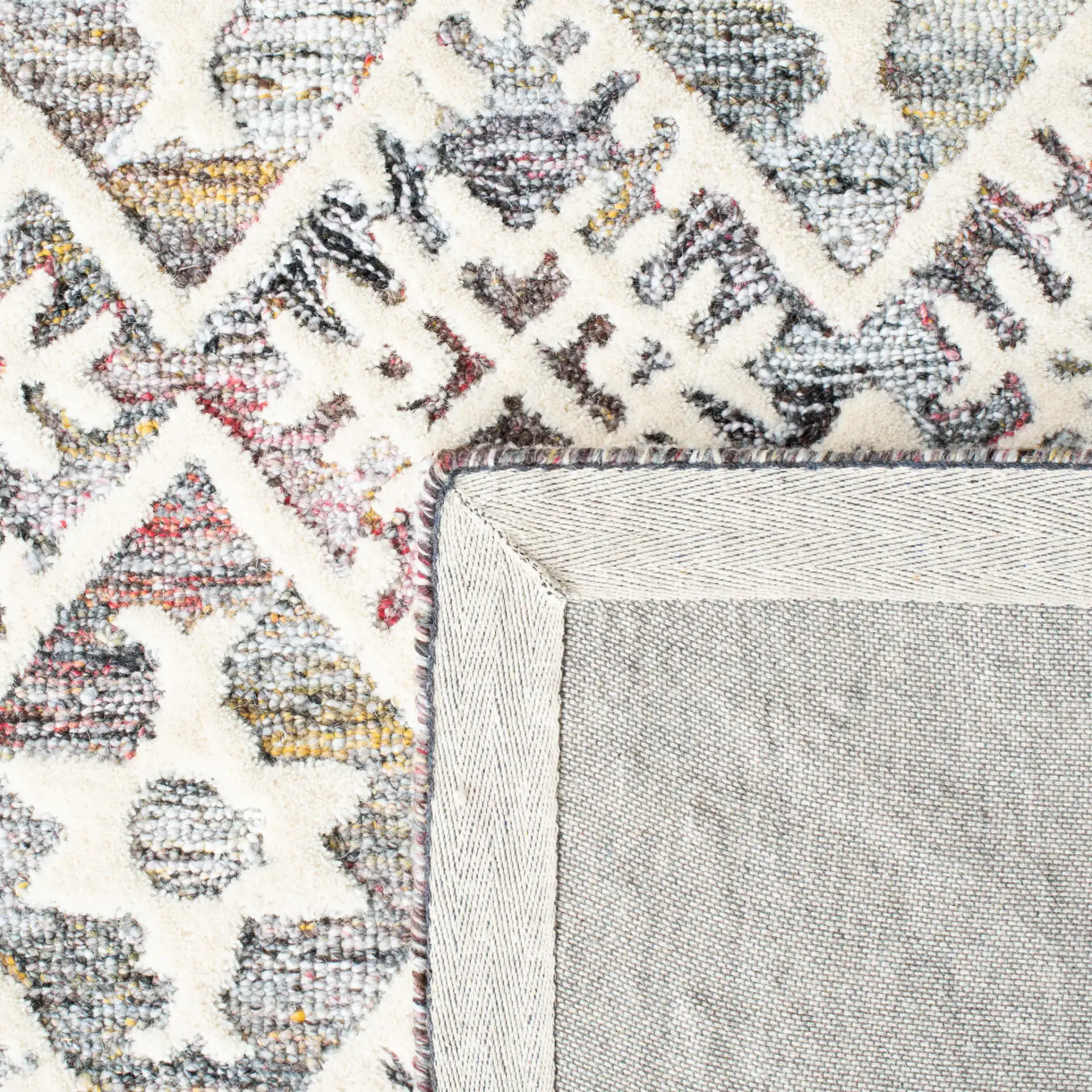 Roslyn Diamond Grid Hand-Tufted Rug in Red / Ivory in a styled room