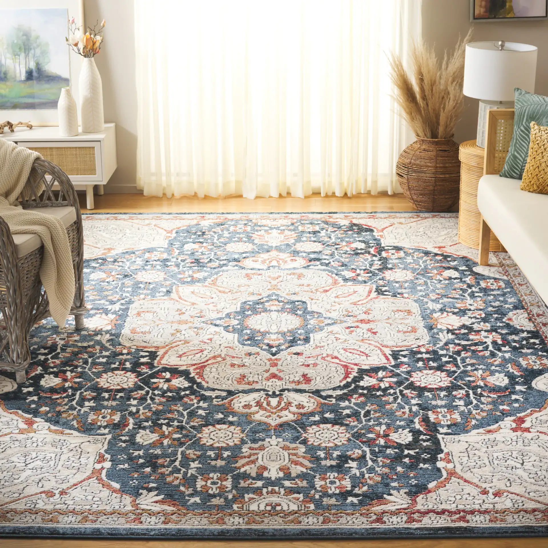 Rosewood Framed Medallion Rug in Ivory / Blue in a styled room