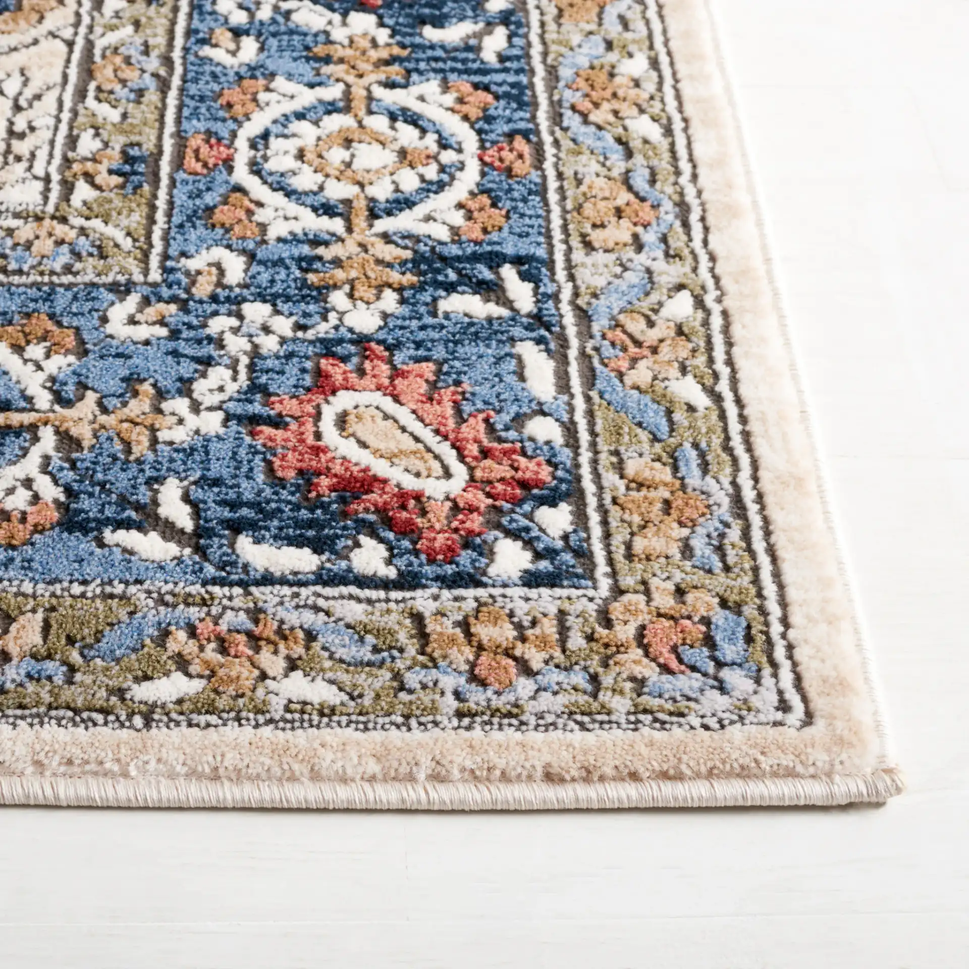 Rosewood Floral Trellis Rug in Ivory / Blue in a styled room