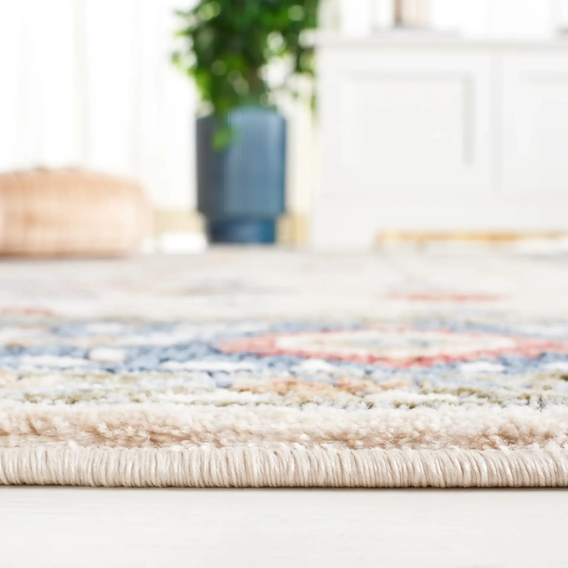 Rosewood Floral Trellis Rug in Ivory / Blue in a styled room