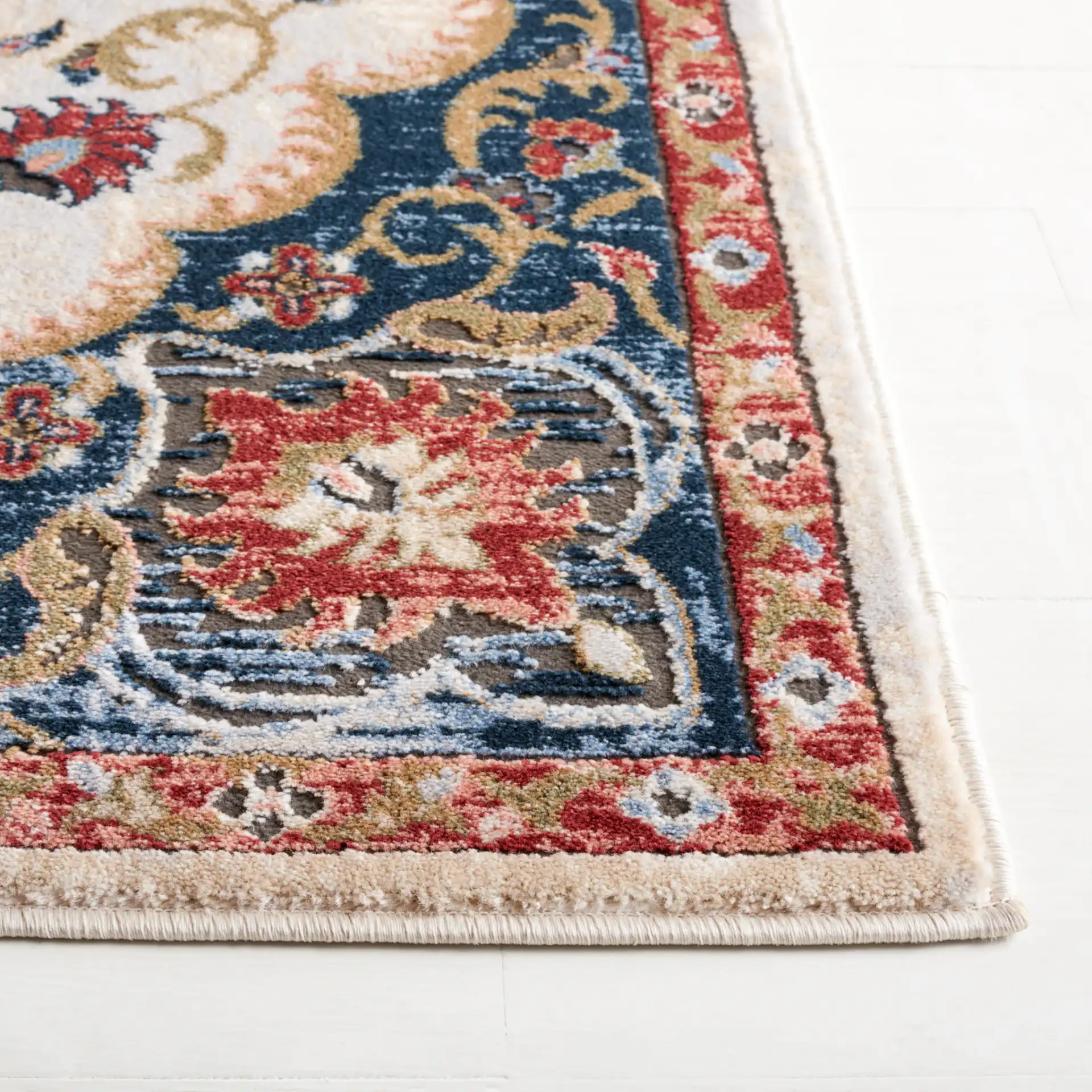 Rosewood Floral Medallion Rug in Ivory / Red in a styled room