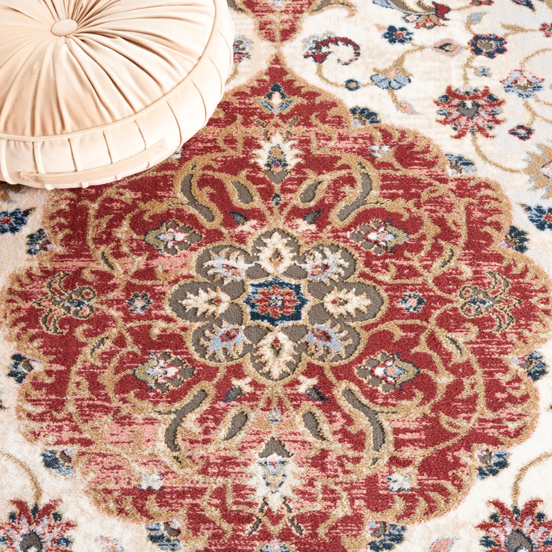 Rosewood Floral Medallion Rug in Ivory / Red in a styled room