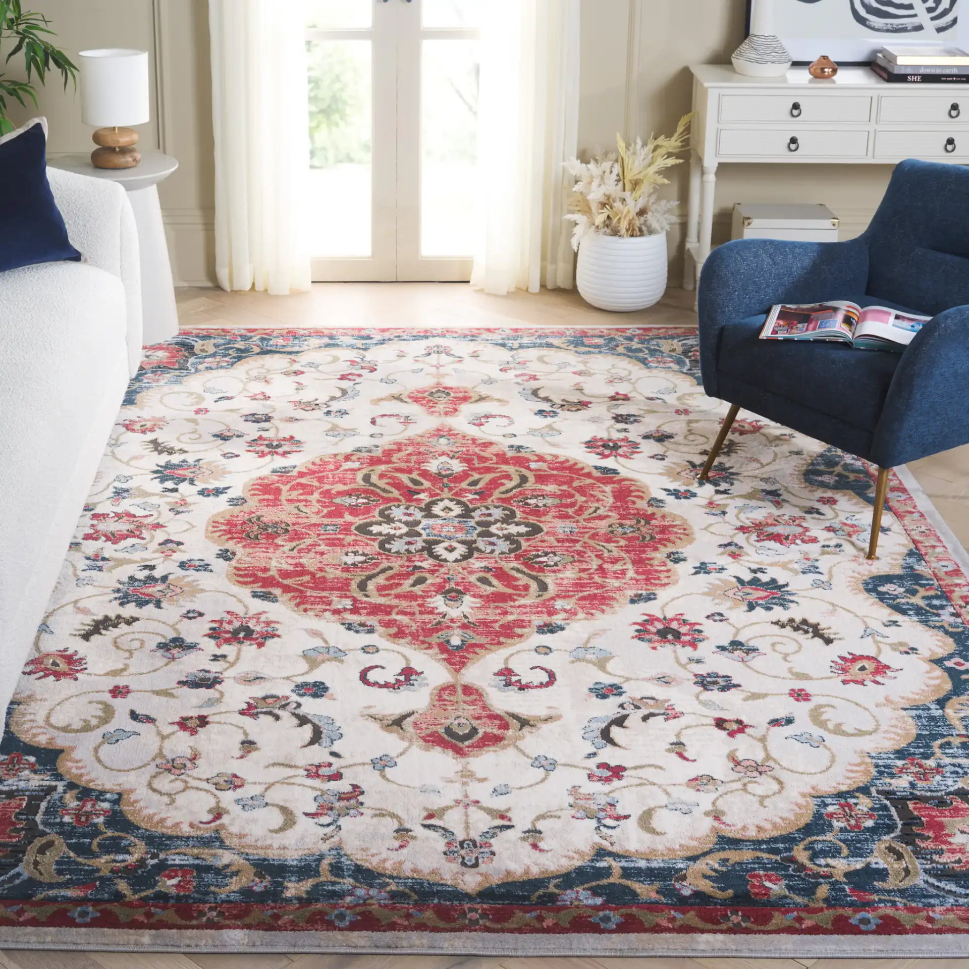Rosewood Floral Medallion Rug in Ivory / Red in a styled room