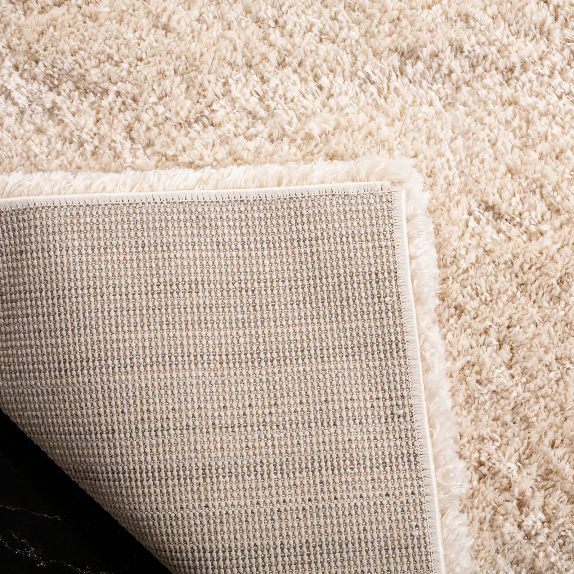 Royal Solid Tonal Shag Rug in Beige in a styled room