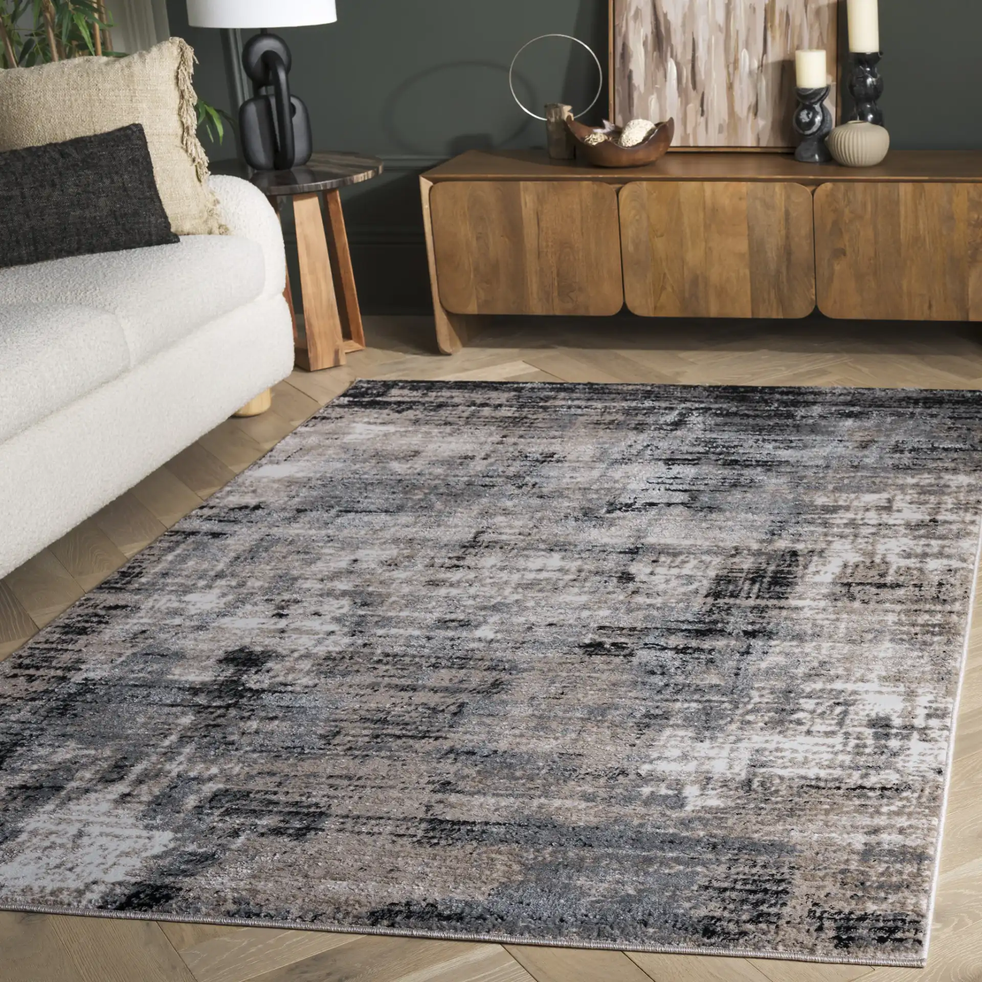 Sable Distressed Abstract Rug in Ivory / Gray Black in a styled room
