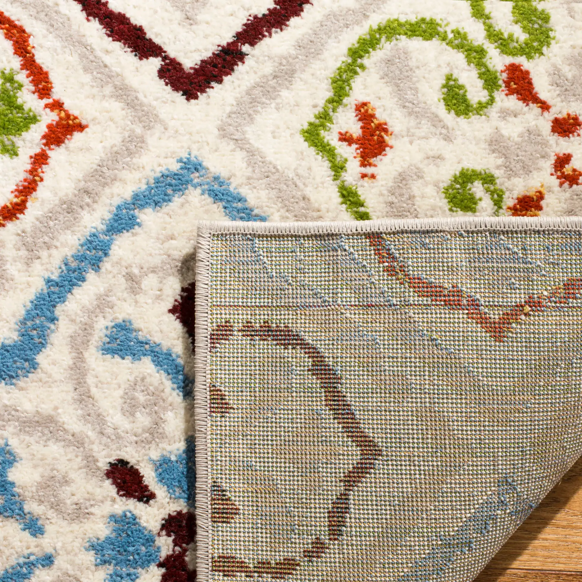 Sagamore Tile Lattice Rug in Light Gray / Terracotta in a styled room
