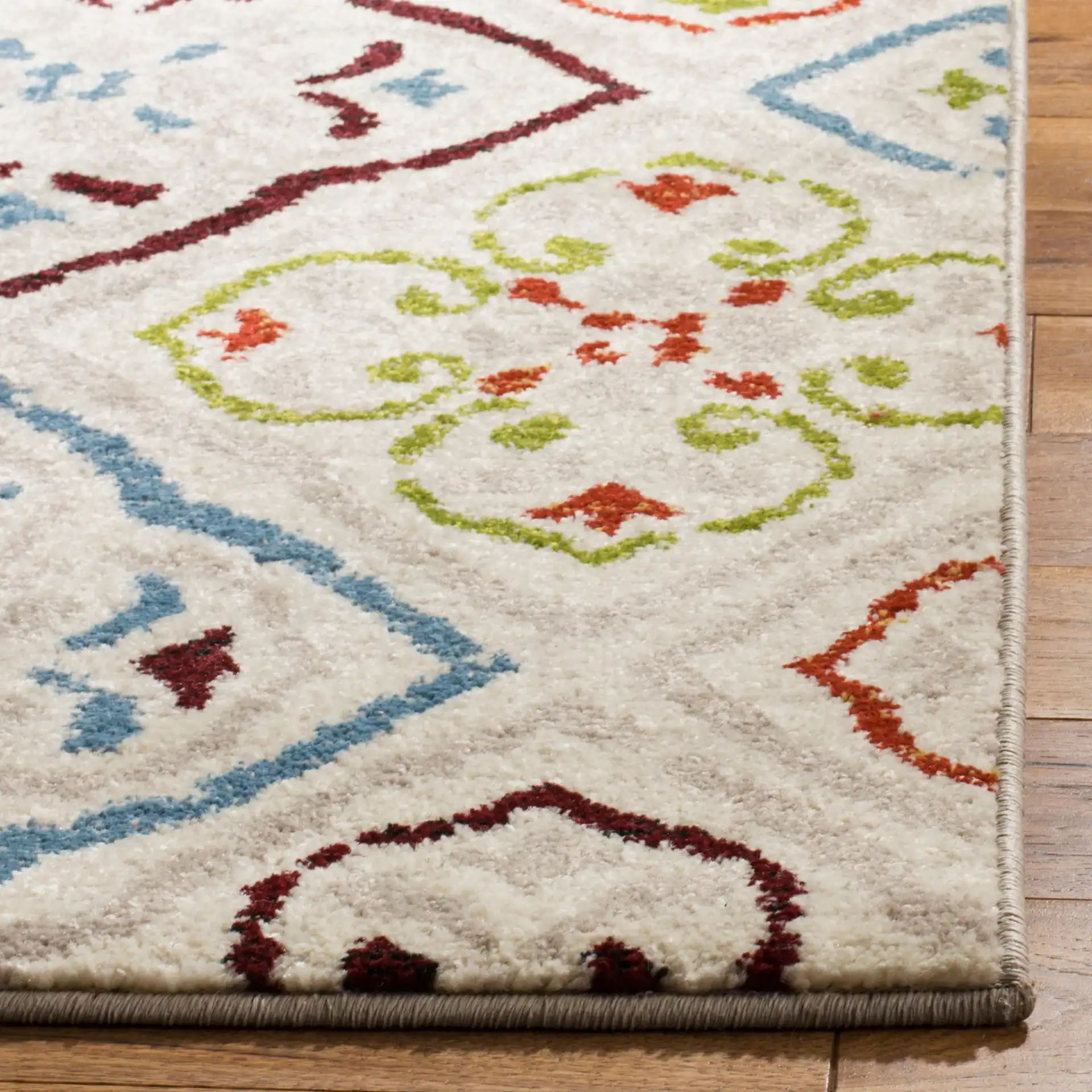 Sagamore Tile Lattice Rug in Light Gray / Terracotta in a styled room