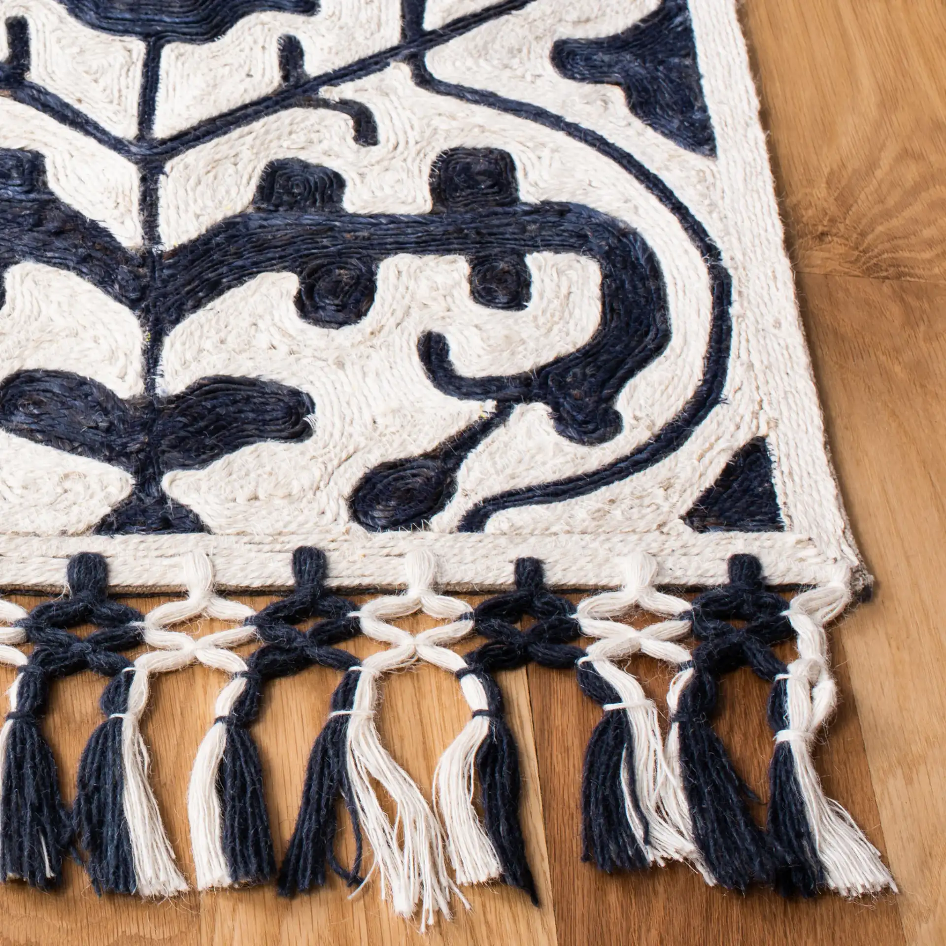 Sahara Trellis Hand-Tufted Rug in Navy / Ivory in a styled room