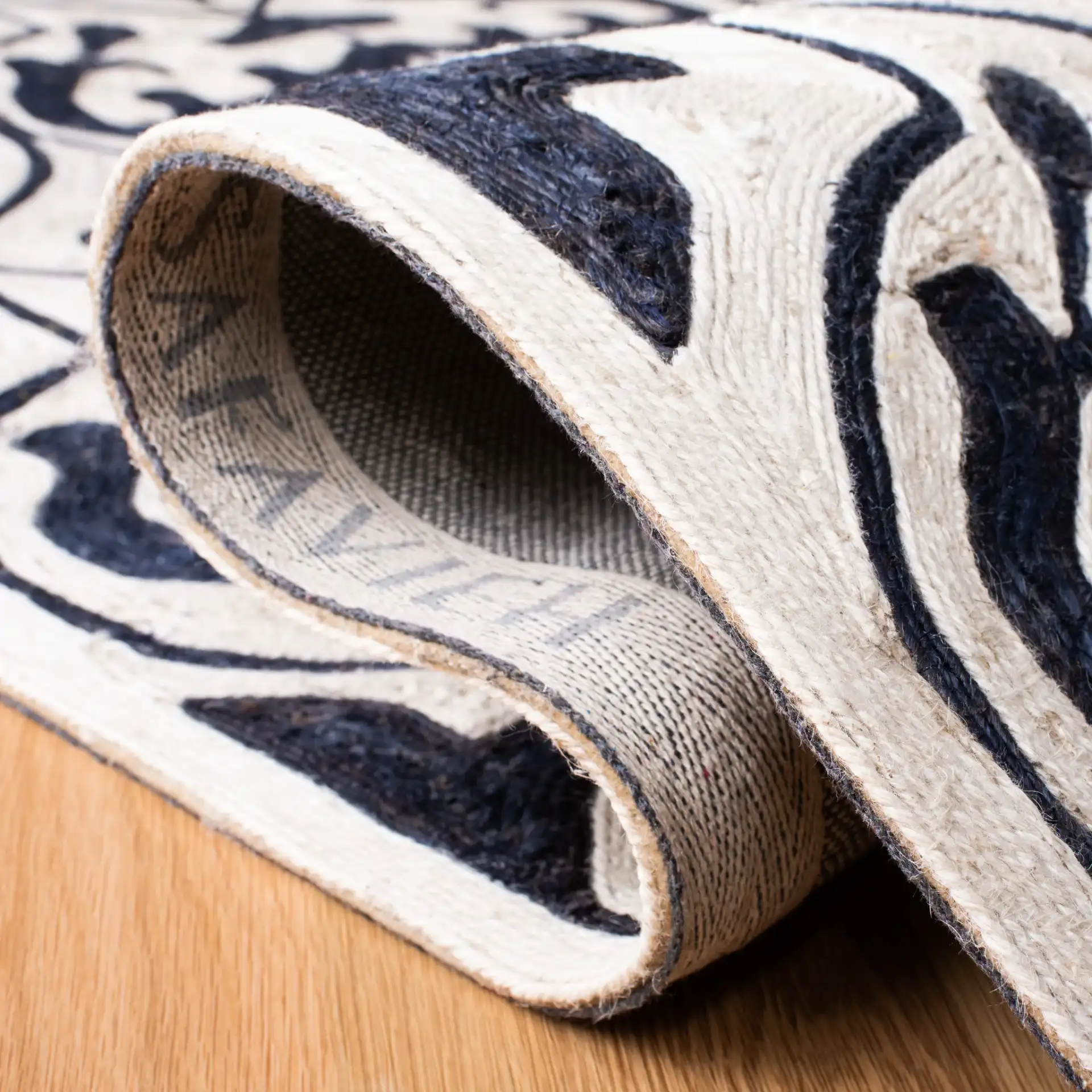 Sahara Trellis Hand-Tufted Rug in Navy / Ivory in a styled room