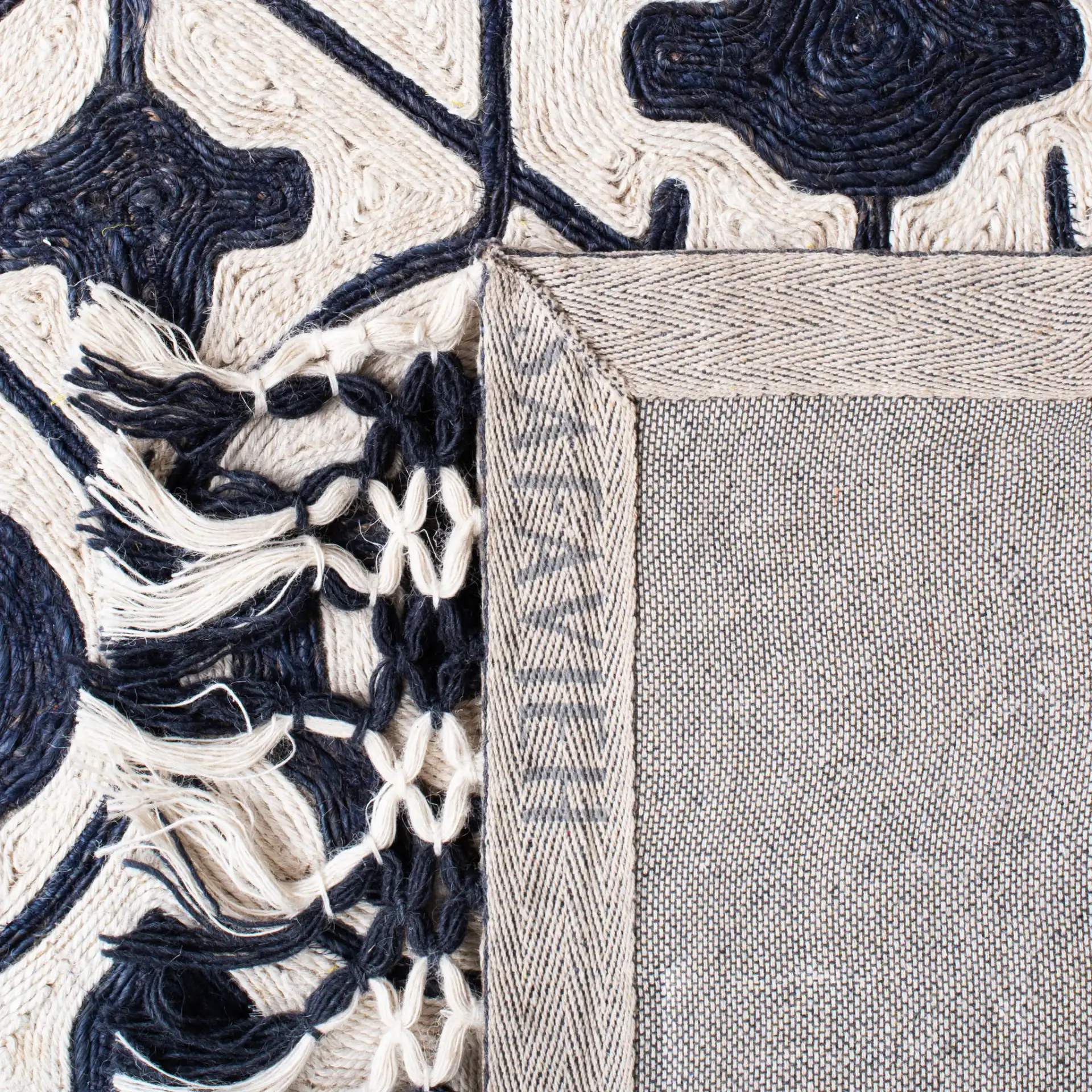 Sahara Trellis Hand-Tufted Rug in Navy / Ivory in a styled room