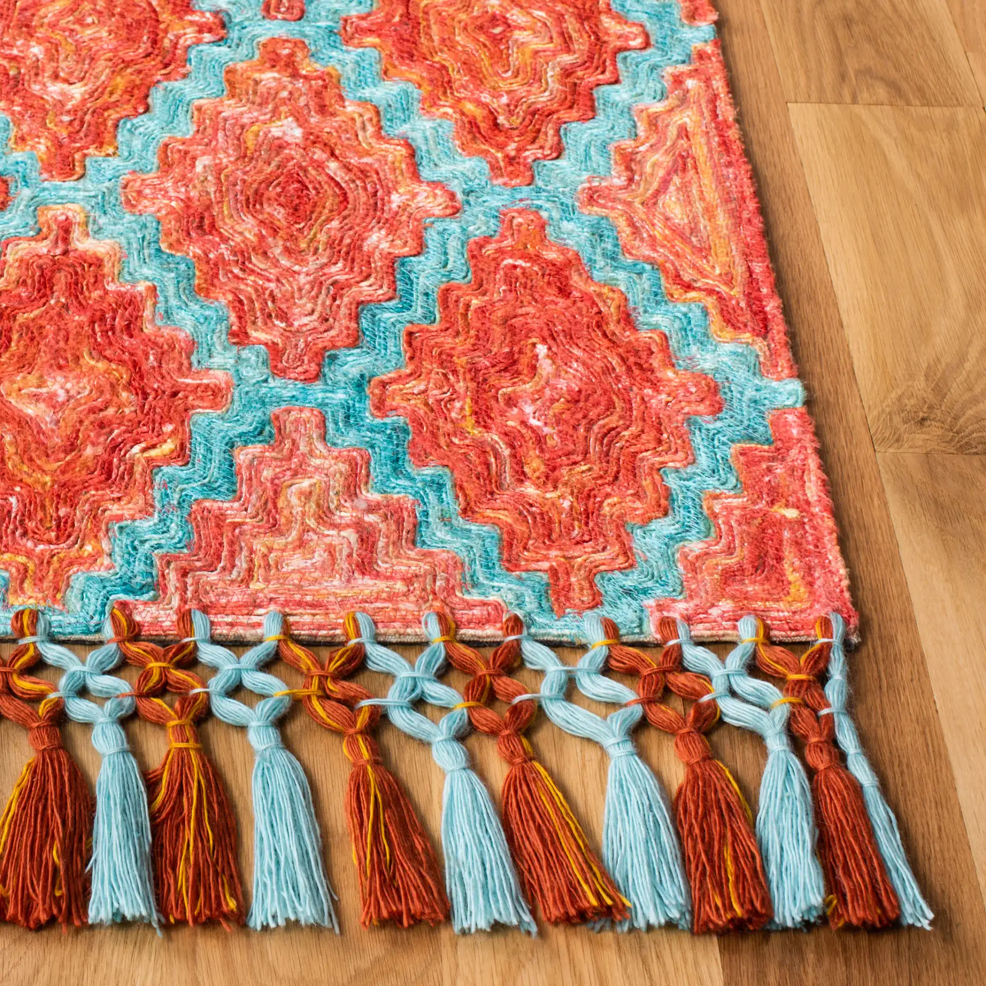 Sahara Stepped Diamond Hand-Tufted Rug in Rust / Aqua in a styled room