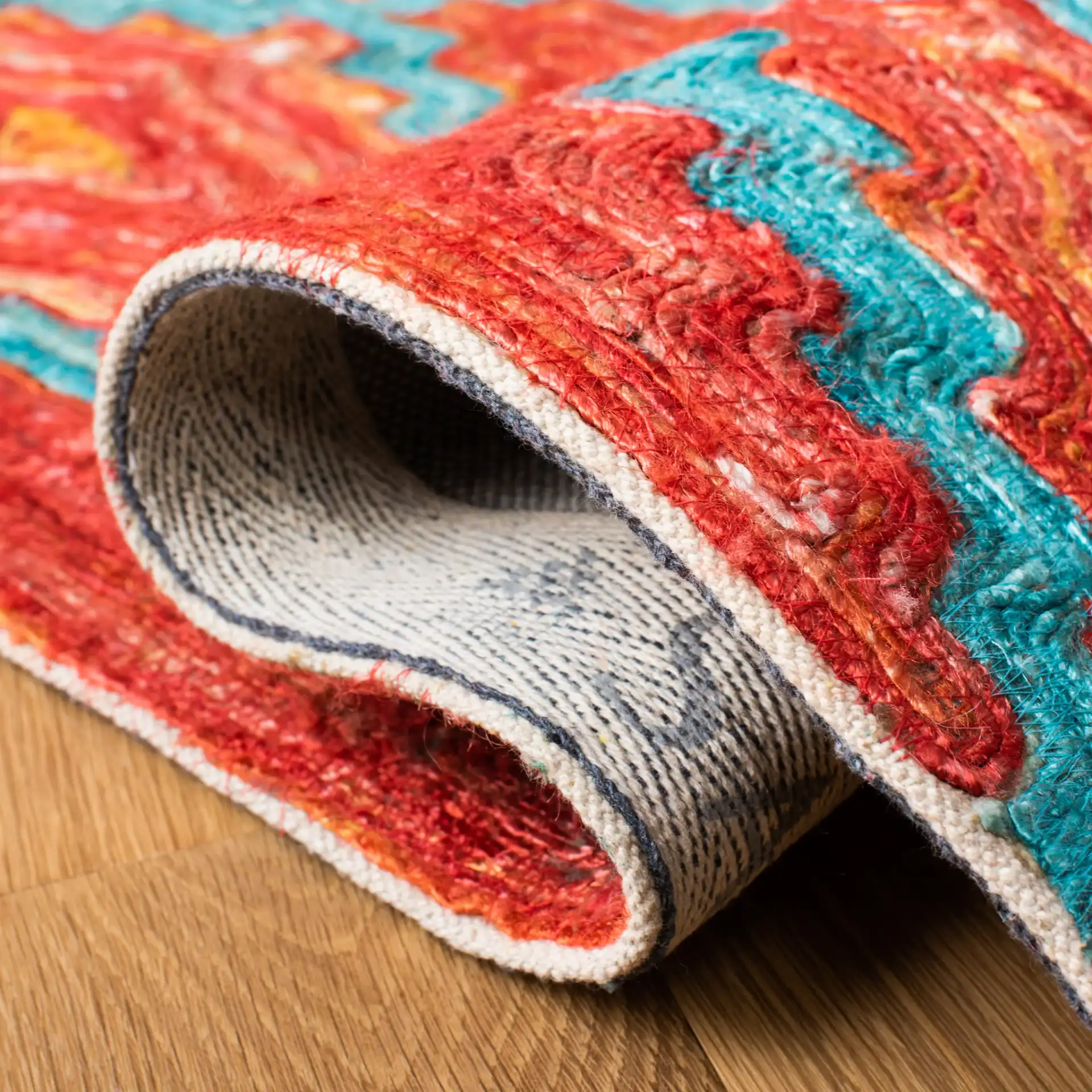Sahara Stepped Diamond Hand-Tufted Rug in Rust / Aqua in a styled room