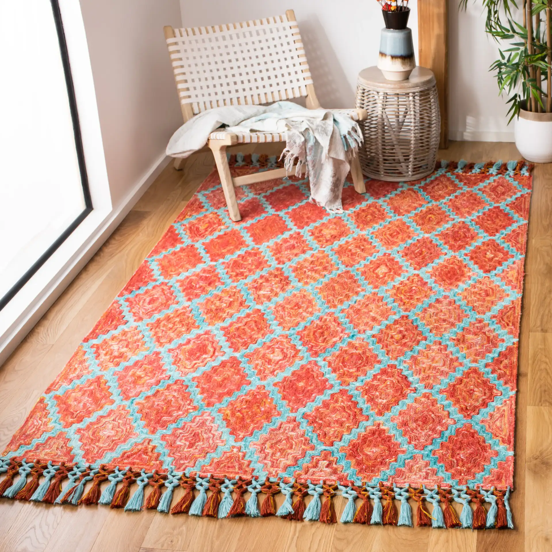 Sahara Stepped Diamond Hand-Tufted Rug in Rust / Aqua in a styled room