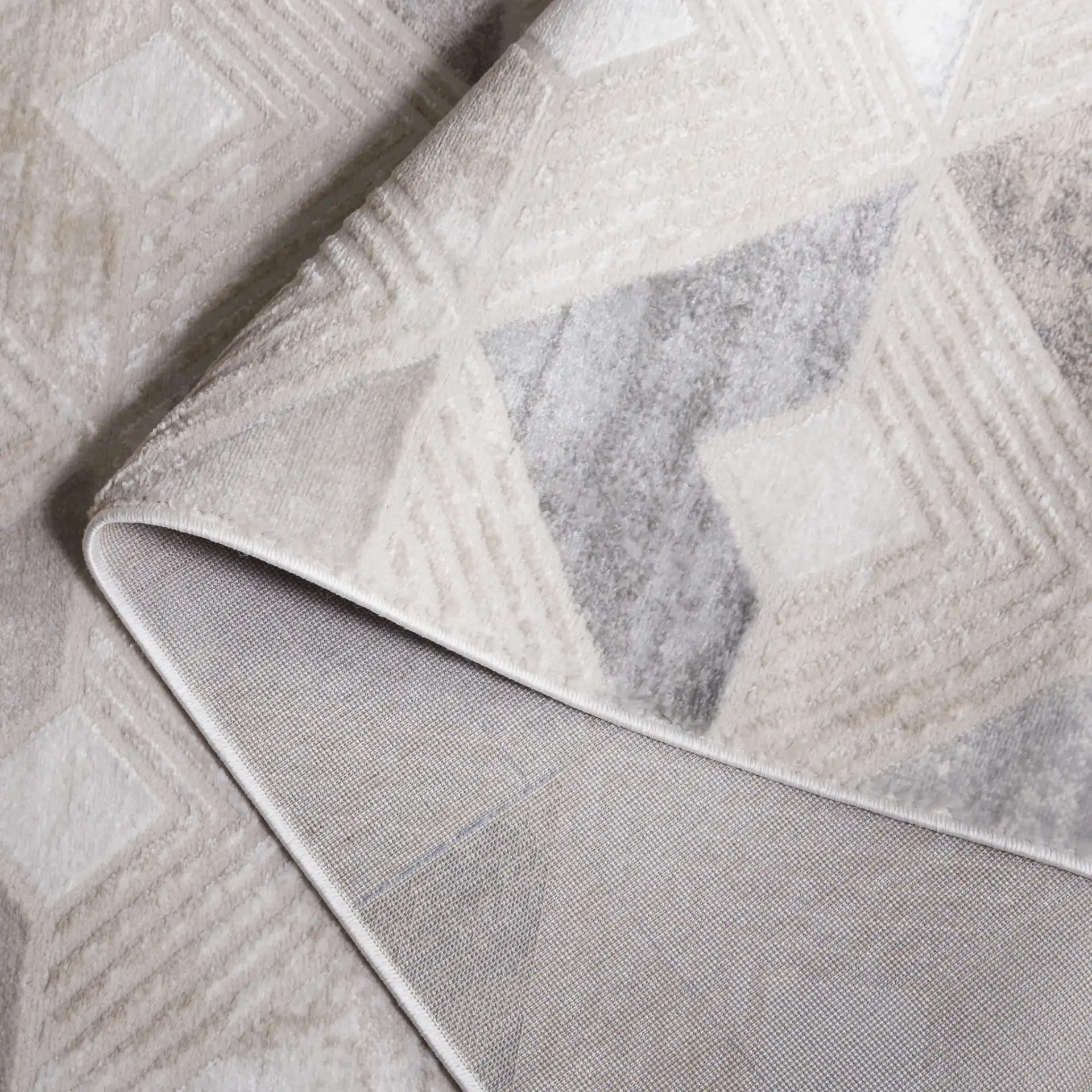 Saylor Chevron Rug in Gray / Dark Gray in a styled room