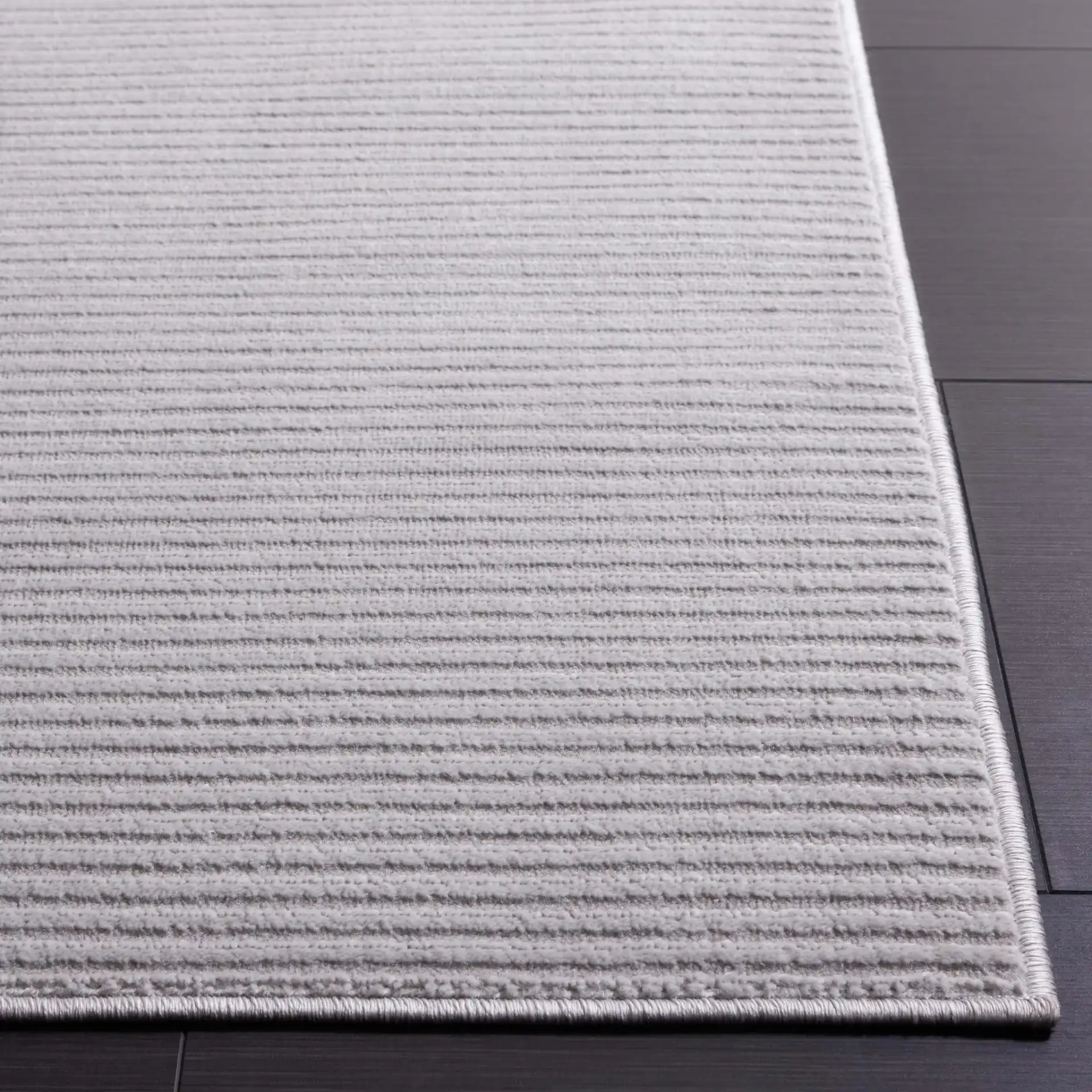 Saylor Ribbed Rug in Gray in a styled room