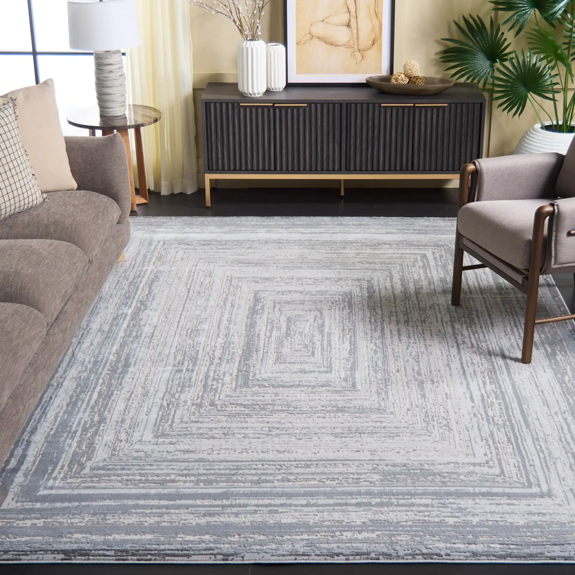 Saylor Concentric Rectangles Rug in Gray / Ivory in a styled room