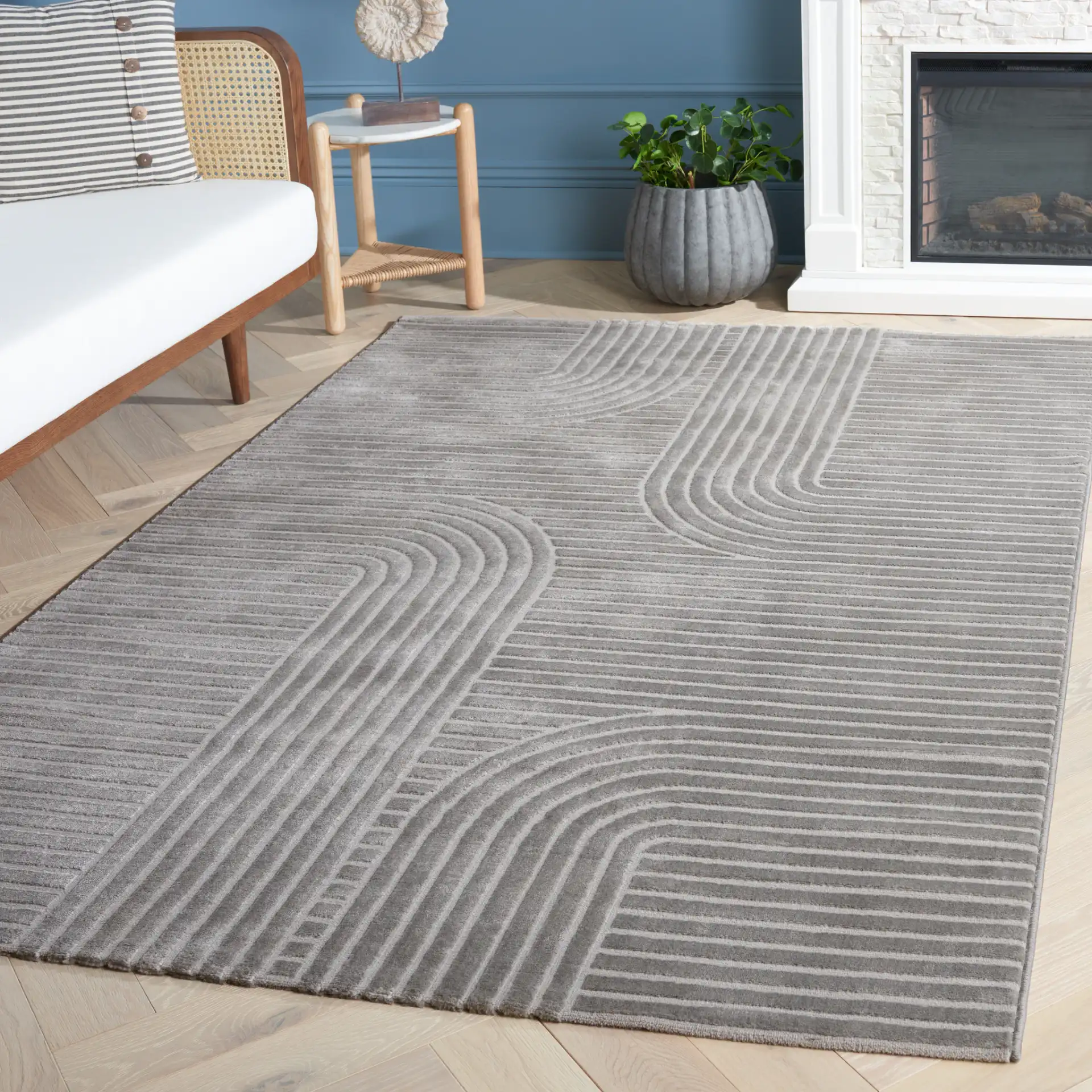 Saylor Arched Stripe Rug in Gray in a styled room