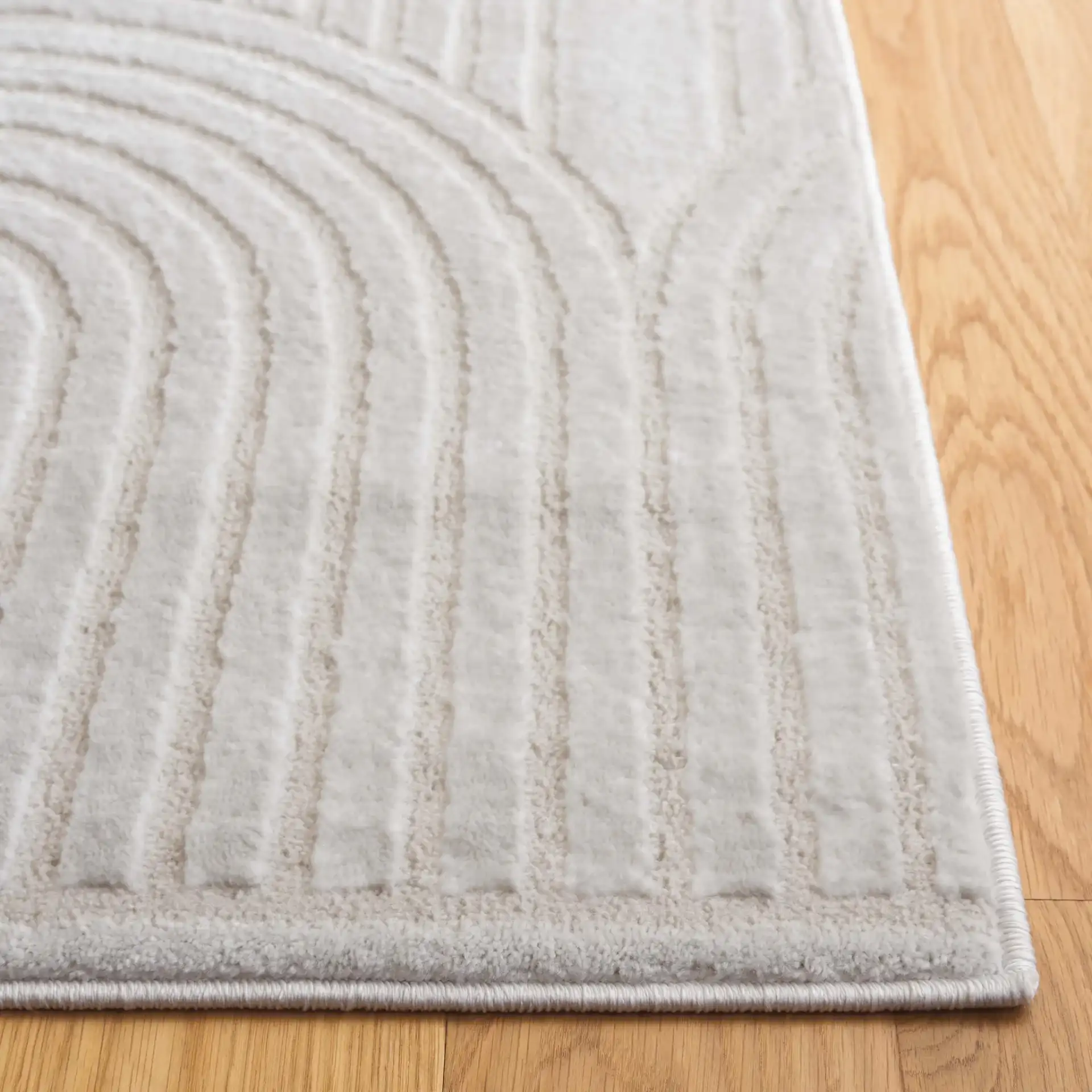 Saylor Concentric Arch Rug in Ivory in a styled room