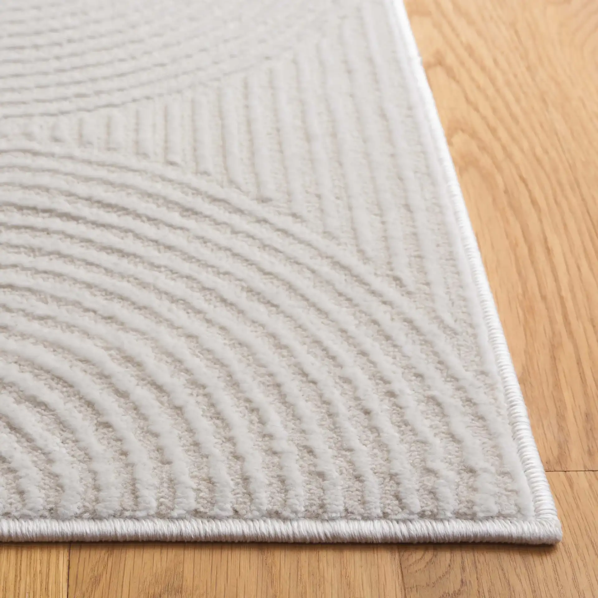 Saylor Concentric Circles Rug in Ivory in a styled room