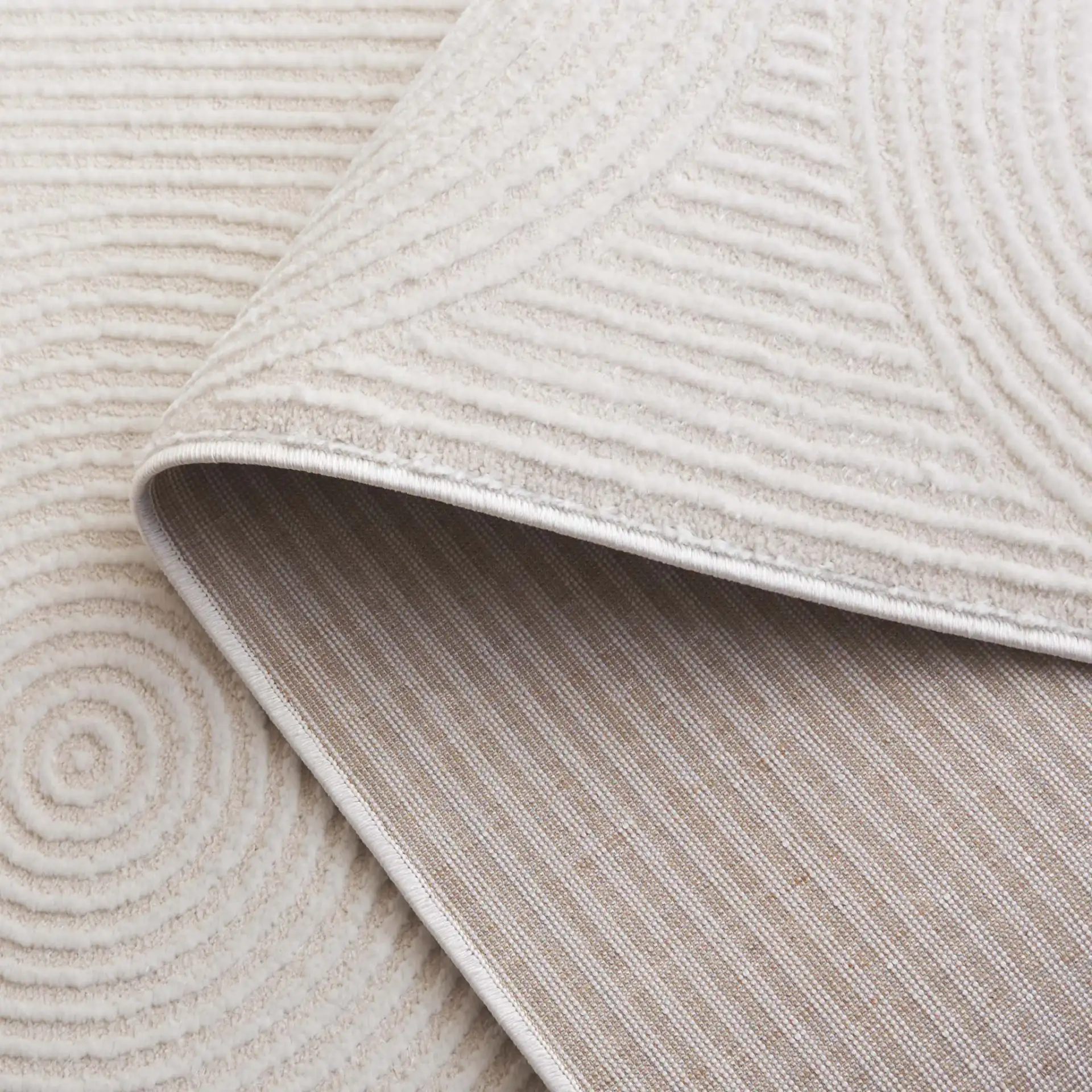 Saylor Concentric Circles Rug in Ivory in a styled room