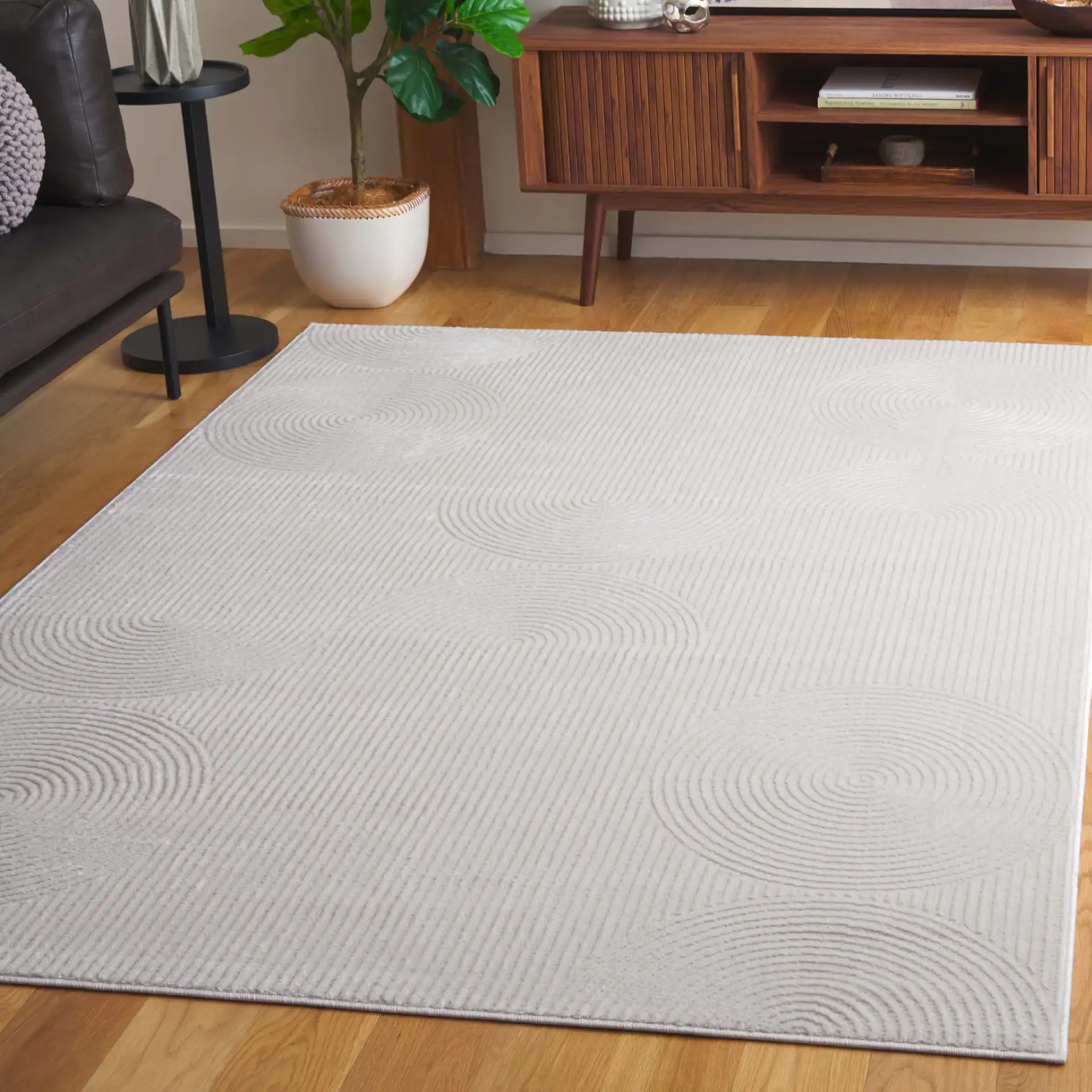 Saylor Concentric Circles Rug in Ivory in a styled room