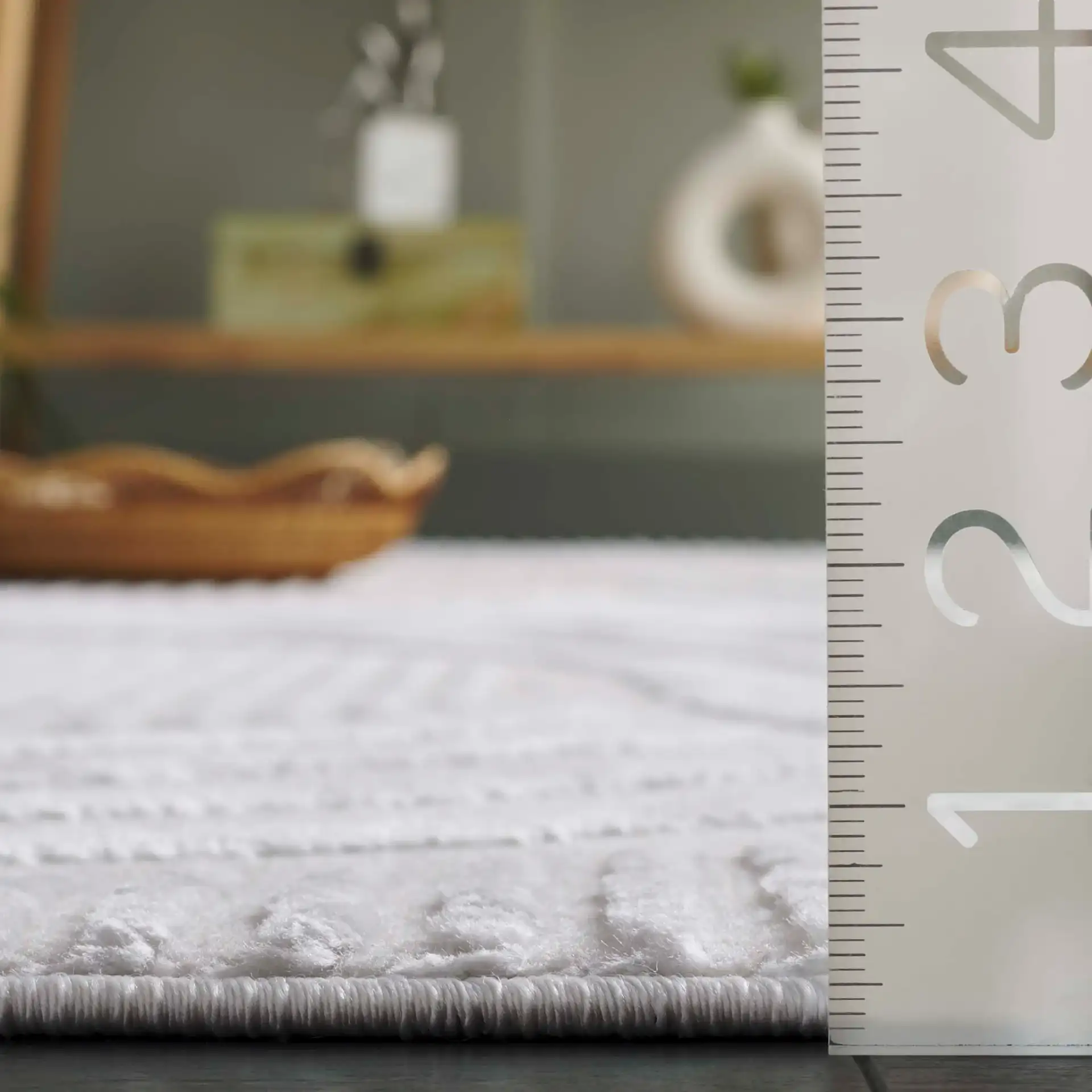 Saylor Intersecting Arcs Rug in Ivory in a styled room