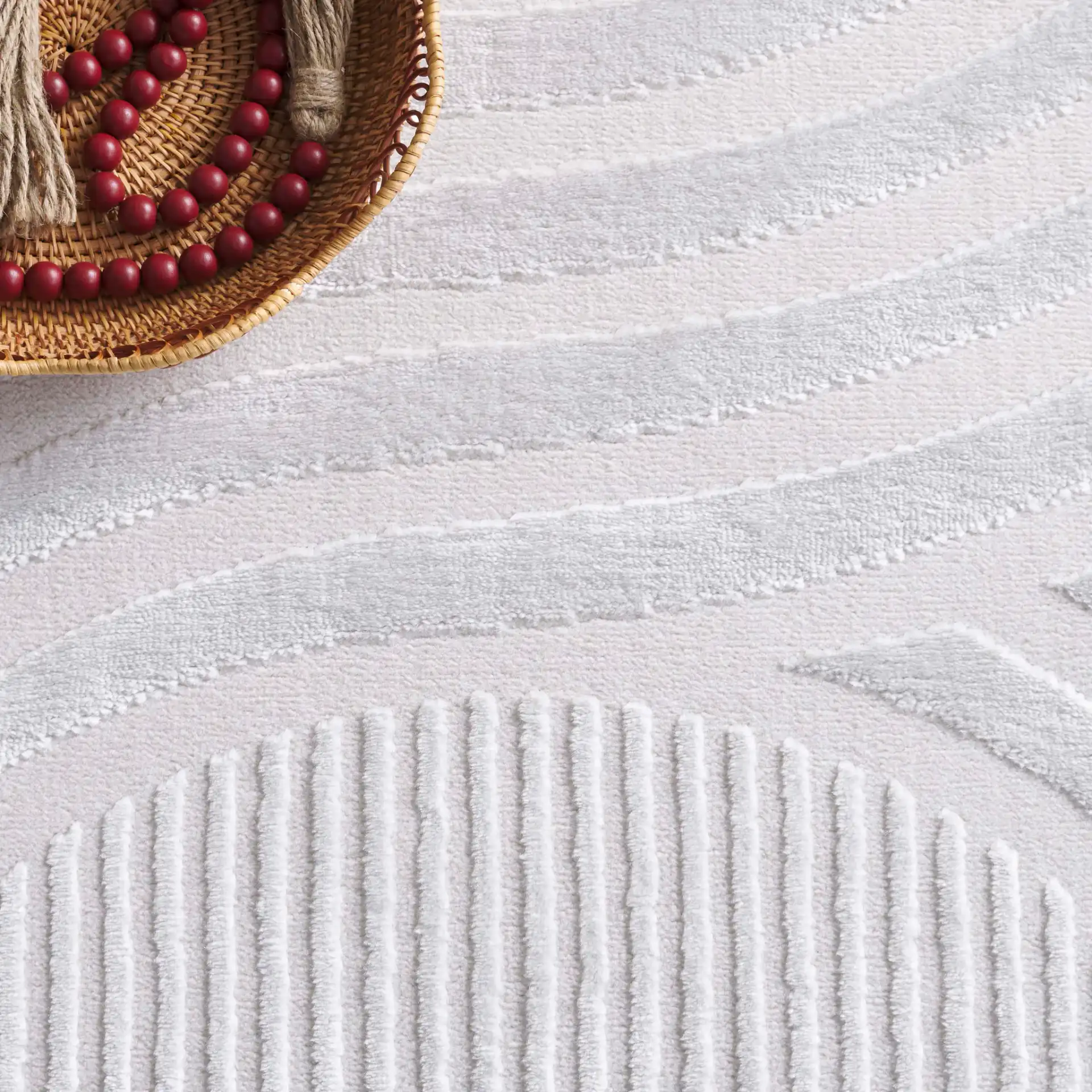 Saylor Intersecting Arcs Rug in Ivory in a styled room