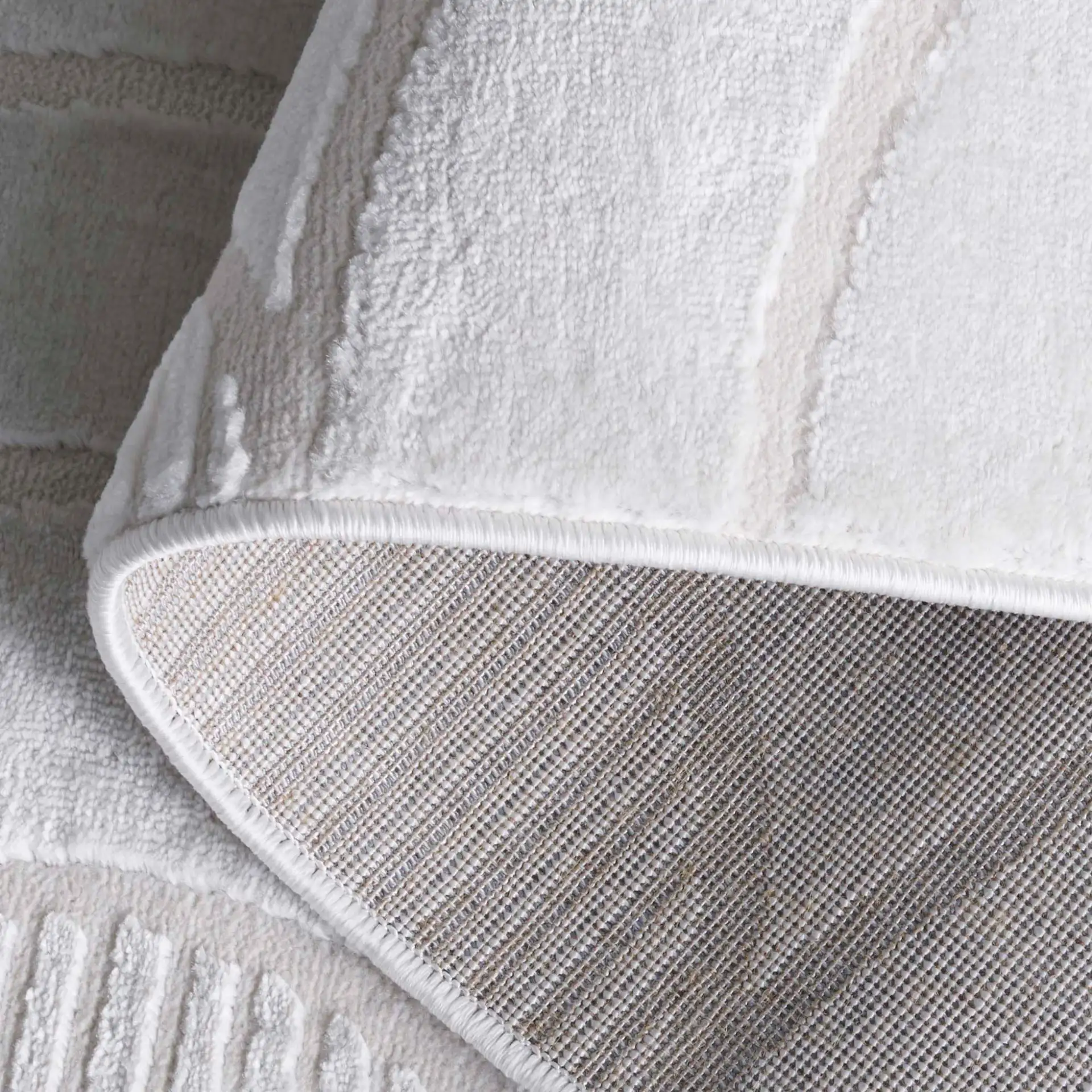 Saylor Arch Rug in Ivory in a styled room